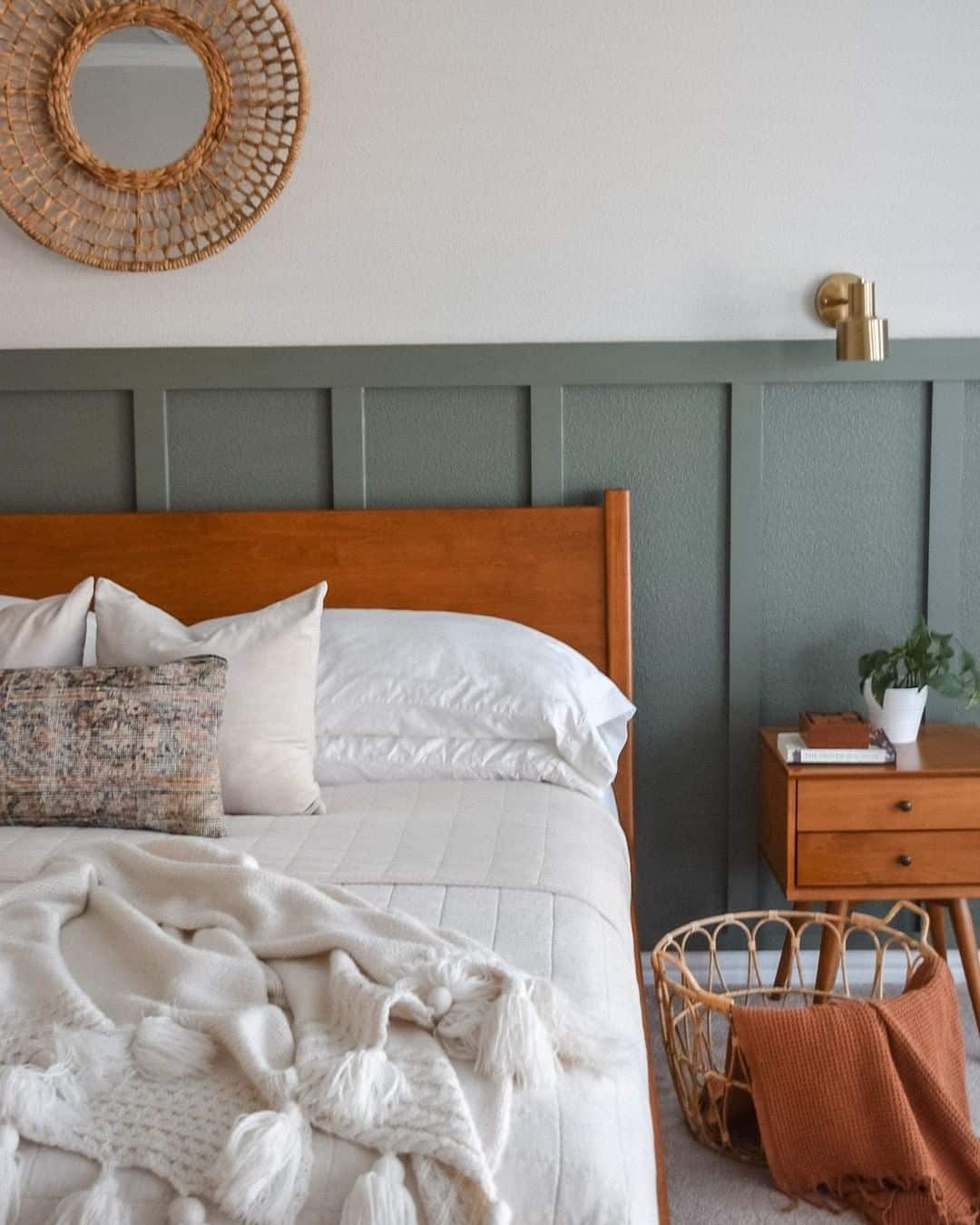 Sage Green Board and Batten Above a Wooden Headboard