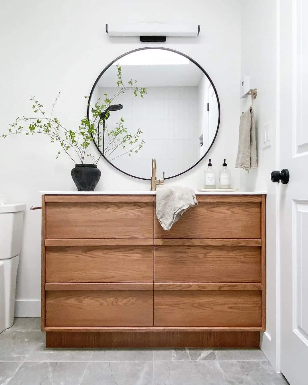 Warm Wood Vanity with Integrated Drawer Pulls