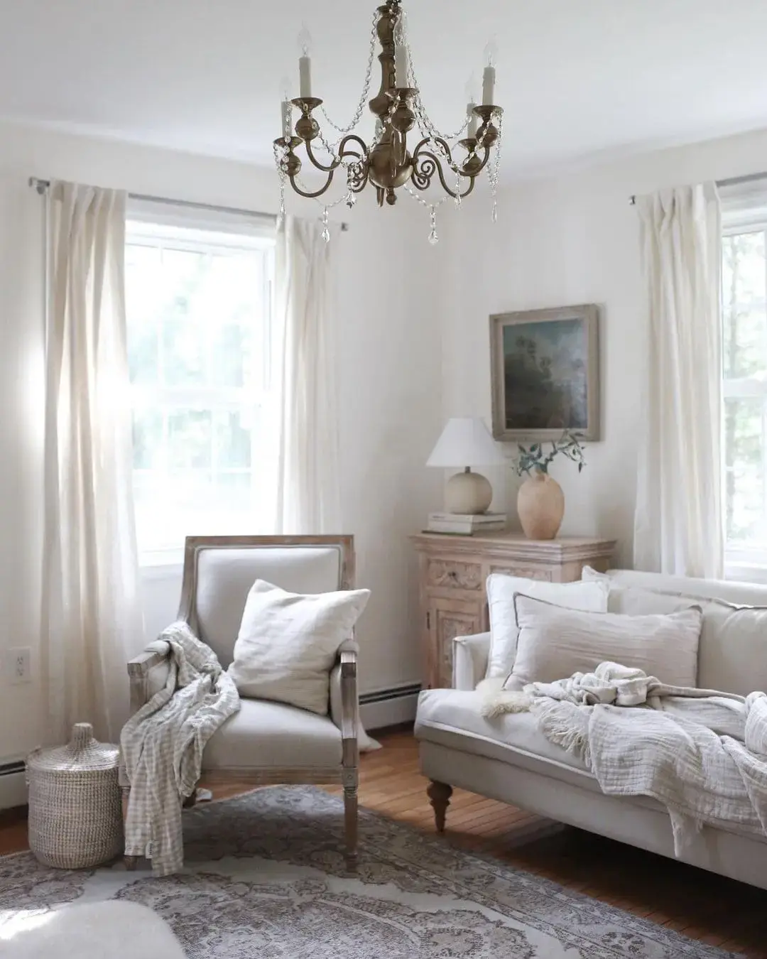 Distressed Persian Rug Adds Patterned Depth To Neutral Room