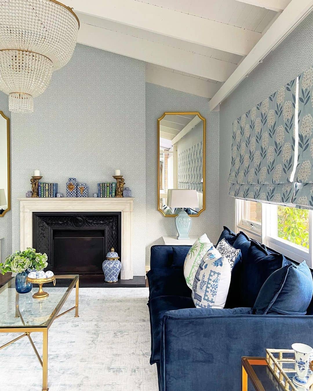 Tall Gold-Framed Mirror Creates a Dramatic Focal Point
