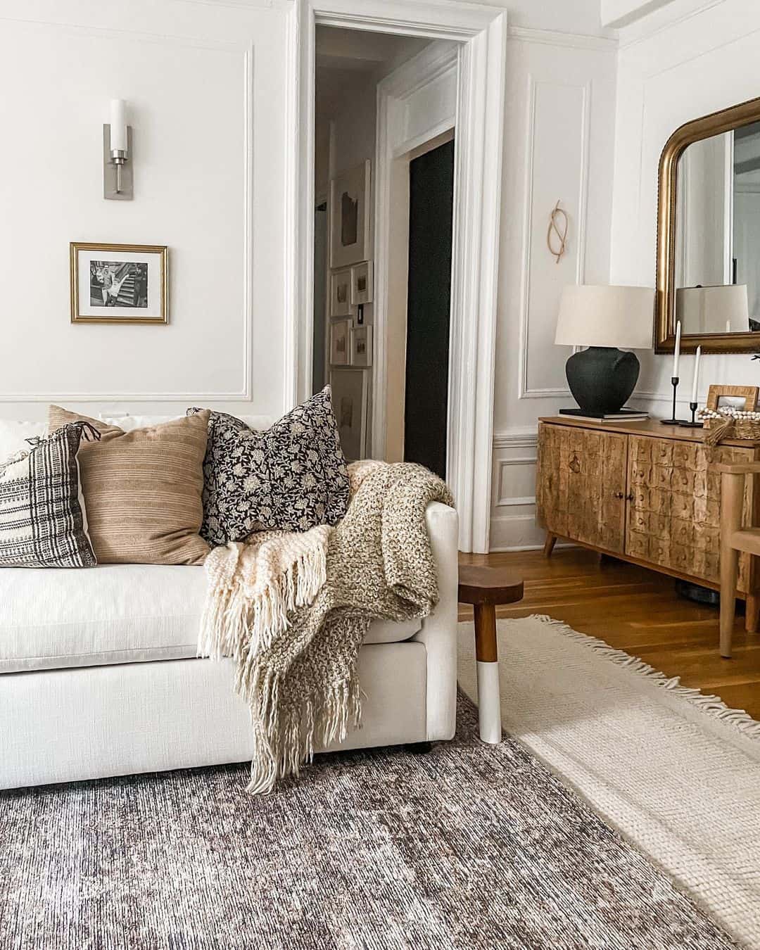 Layered Throws Add Cozy Texture to a White Sofa