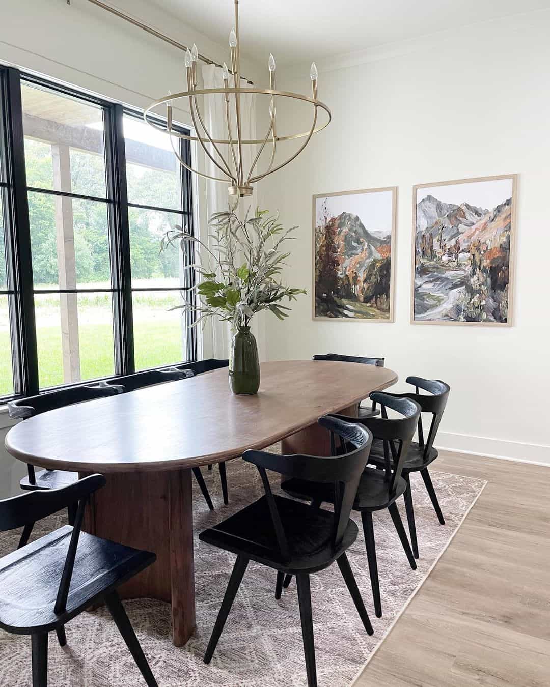 Dark Wood Table with Sculptural Black Chairs