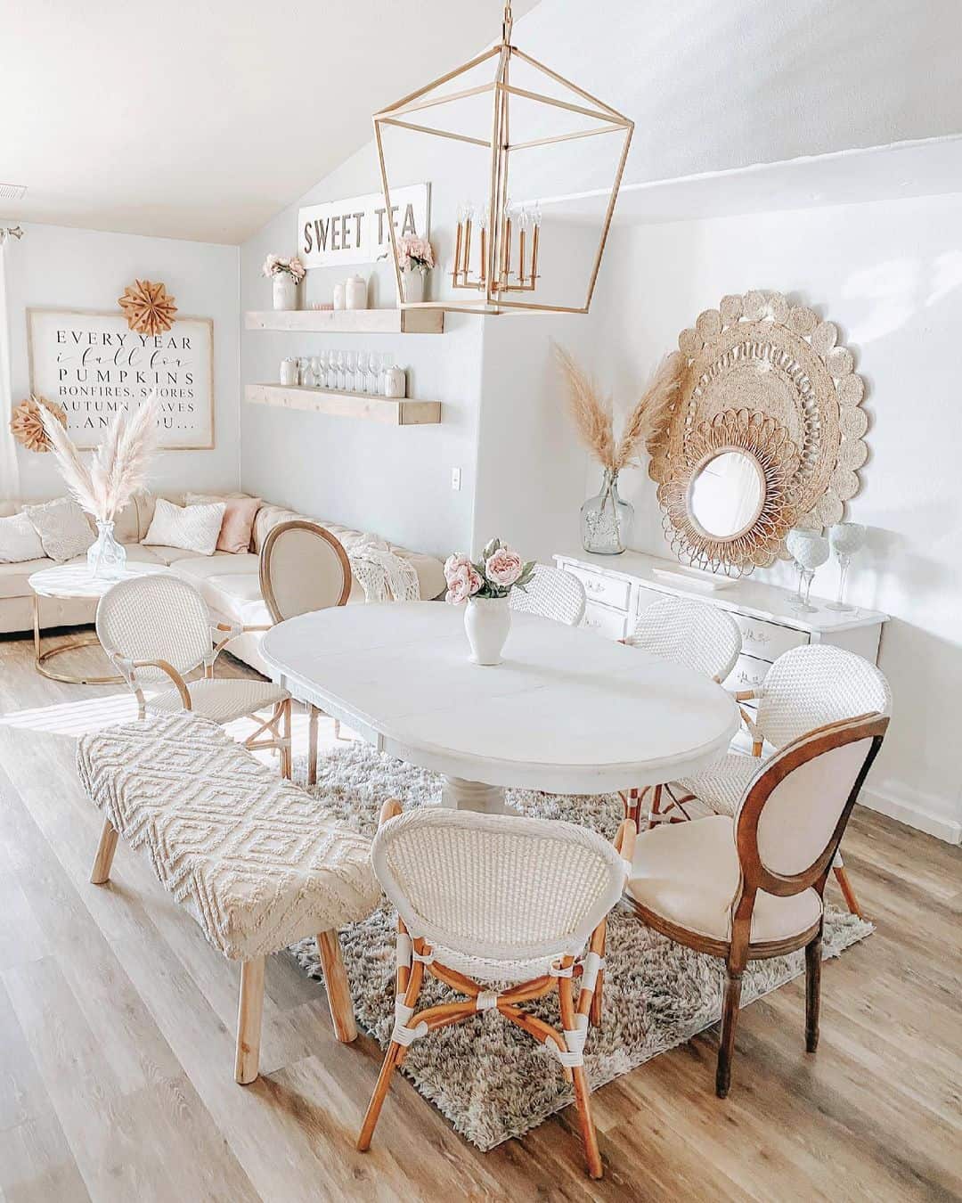 White Oval Table with Mixed Seating for Relaxed Dining
