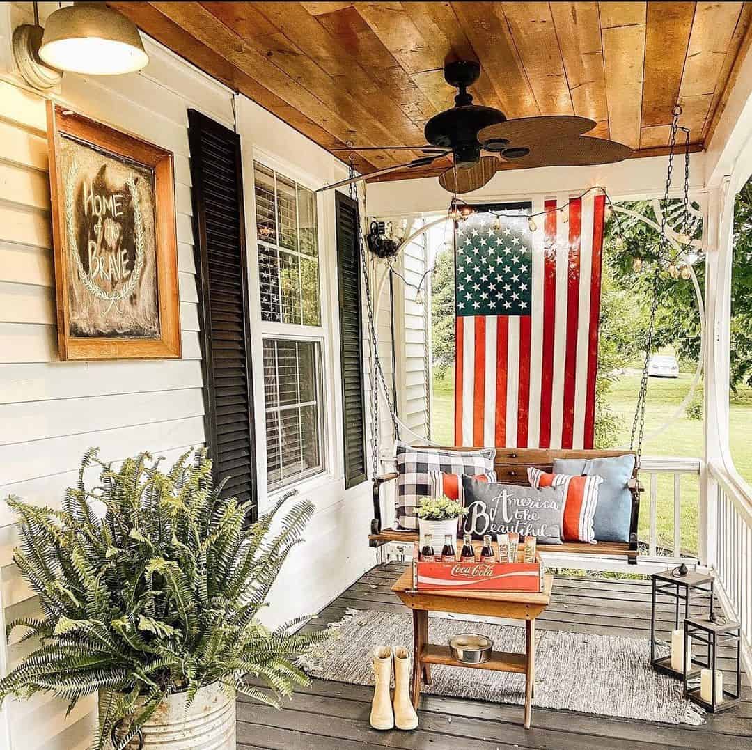 American Flag Hung Behind Porch Swing Adds Patriotic Flair