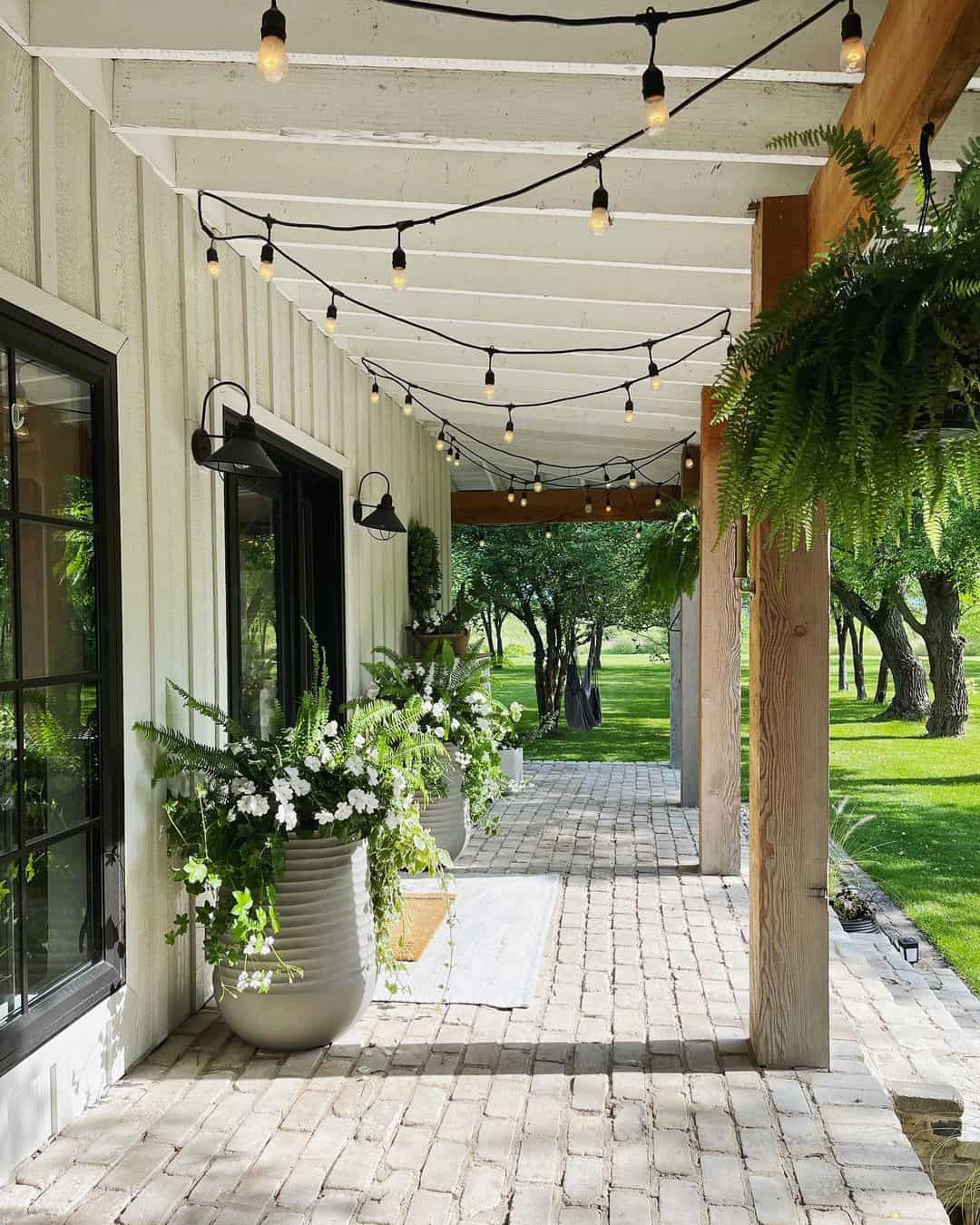 Cafe Lights Drape Over Porch for Evening Ambiance