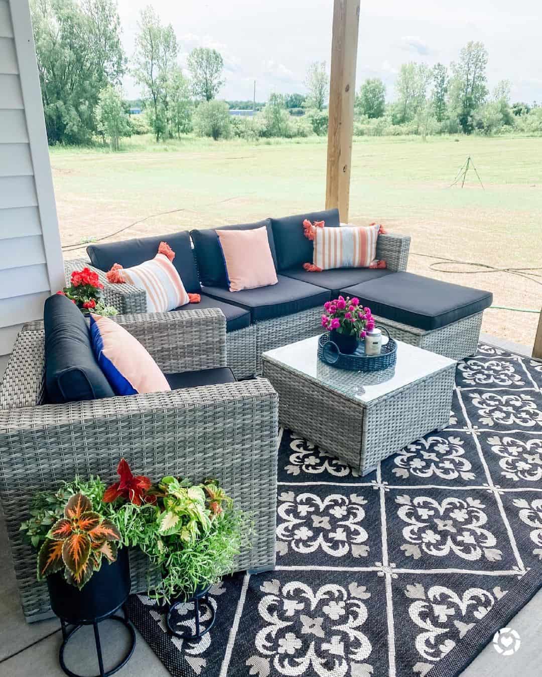 Patterned Rug Anchors Outdoor Seating Area