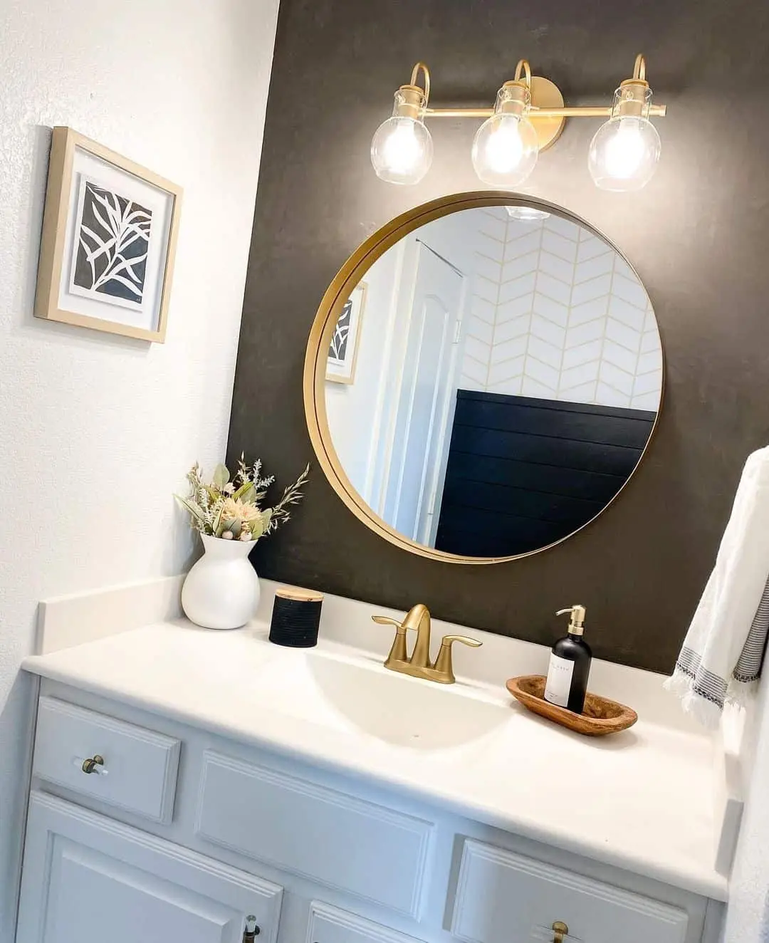 Frame a Textured Wall with a Round Gold Mirror