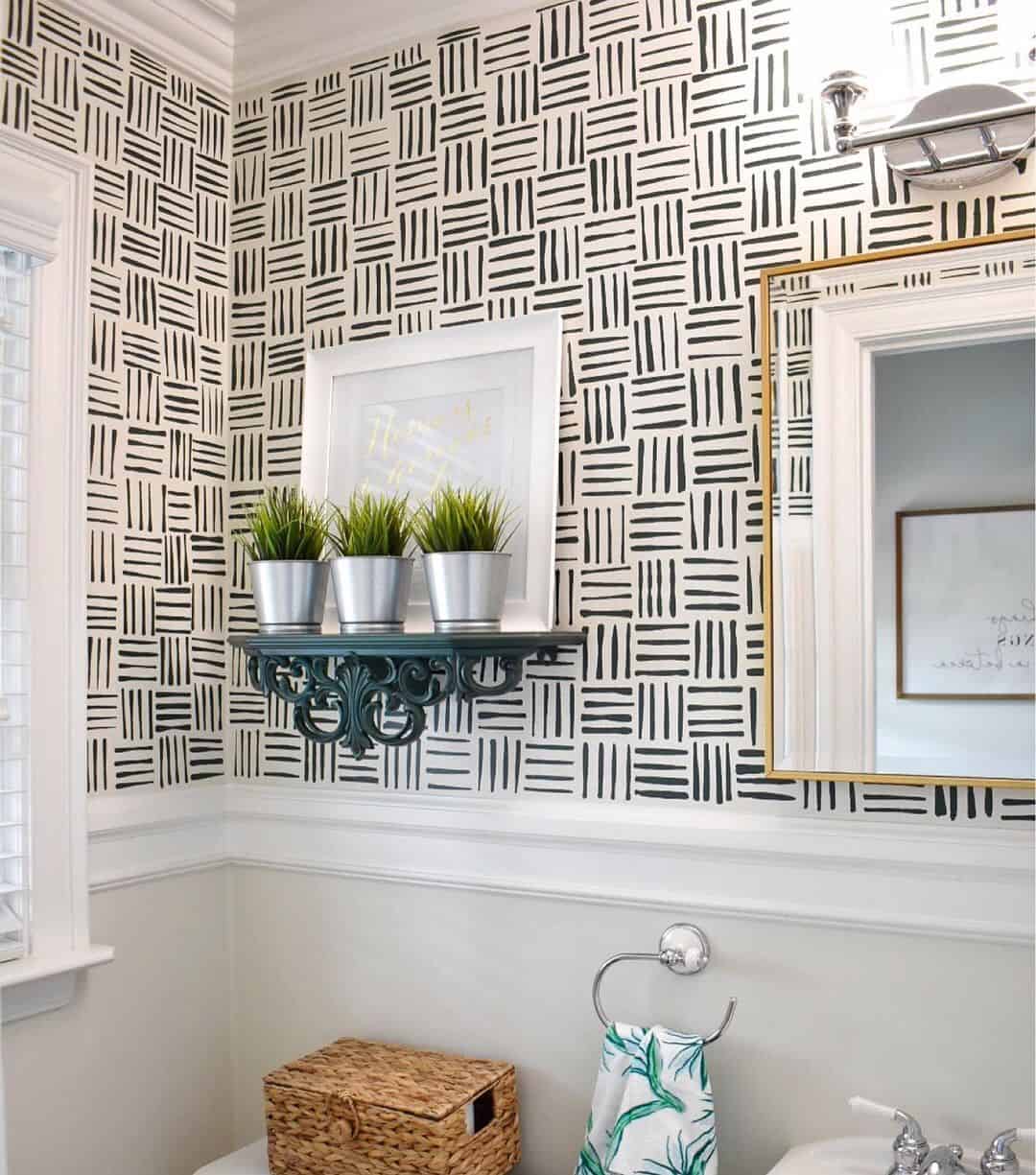 Bold Geometric Wallpaper Anchors a Small Powder Room