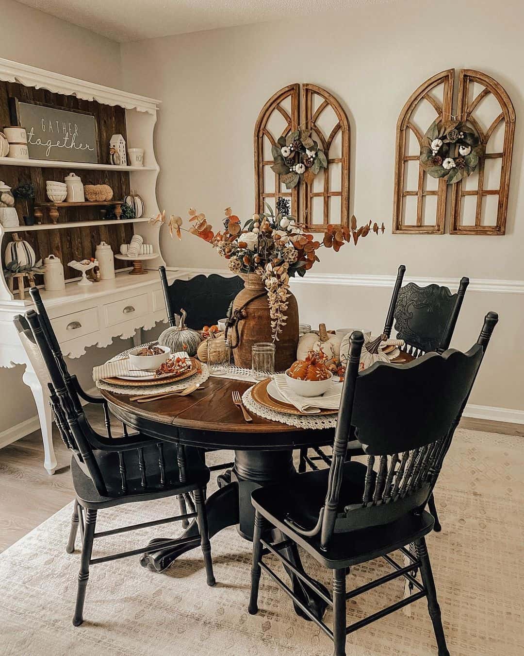 Striking Contrast with Dark Spindle-Back Chairs