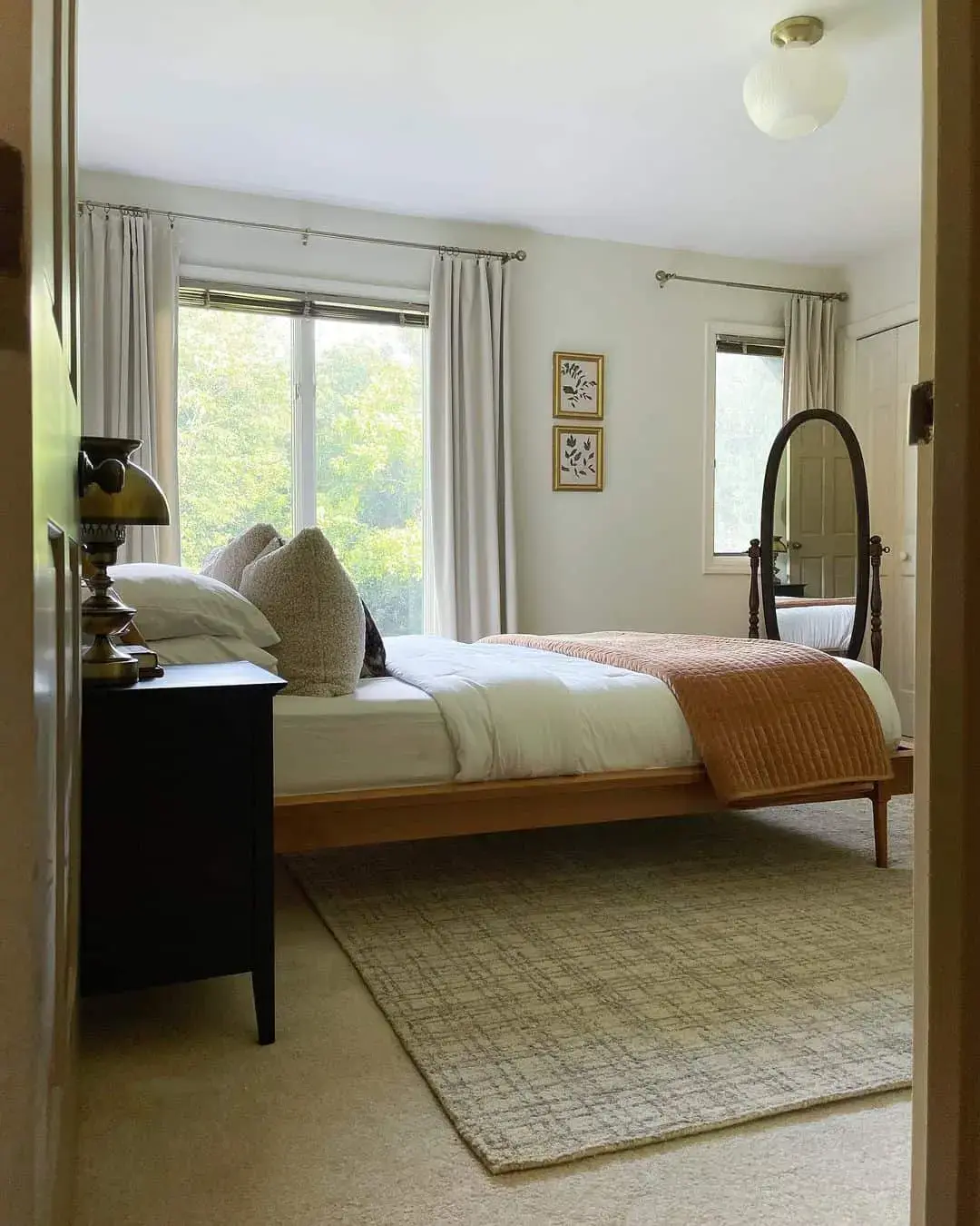 Two Framed Botanical Prints Add Simple Art Above The Bed