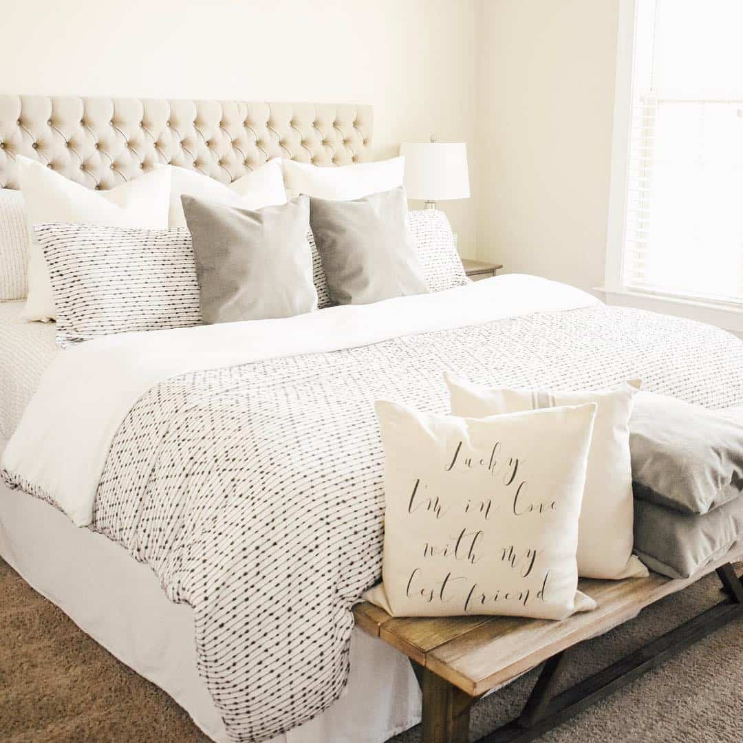Textured Throw Pillows Add a Cozy Layer to a Wooden Bench