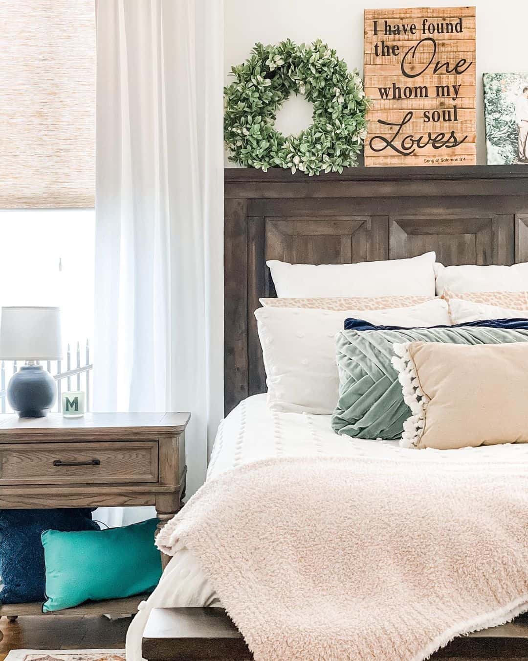 Faux Boxwood Wreath Adds Natural Greenery Above Headboard