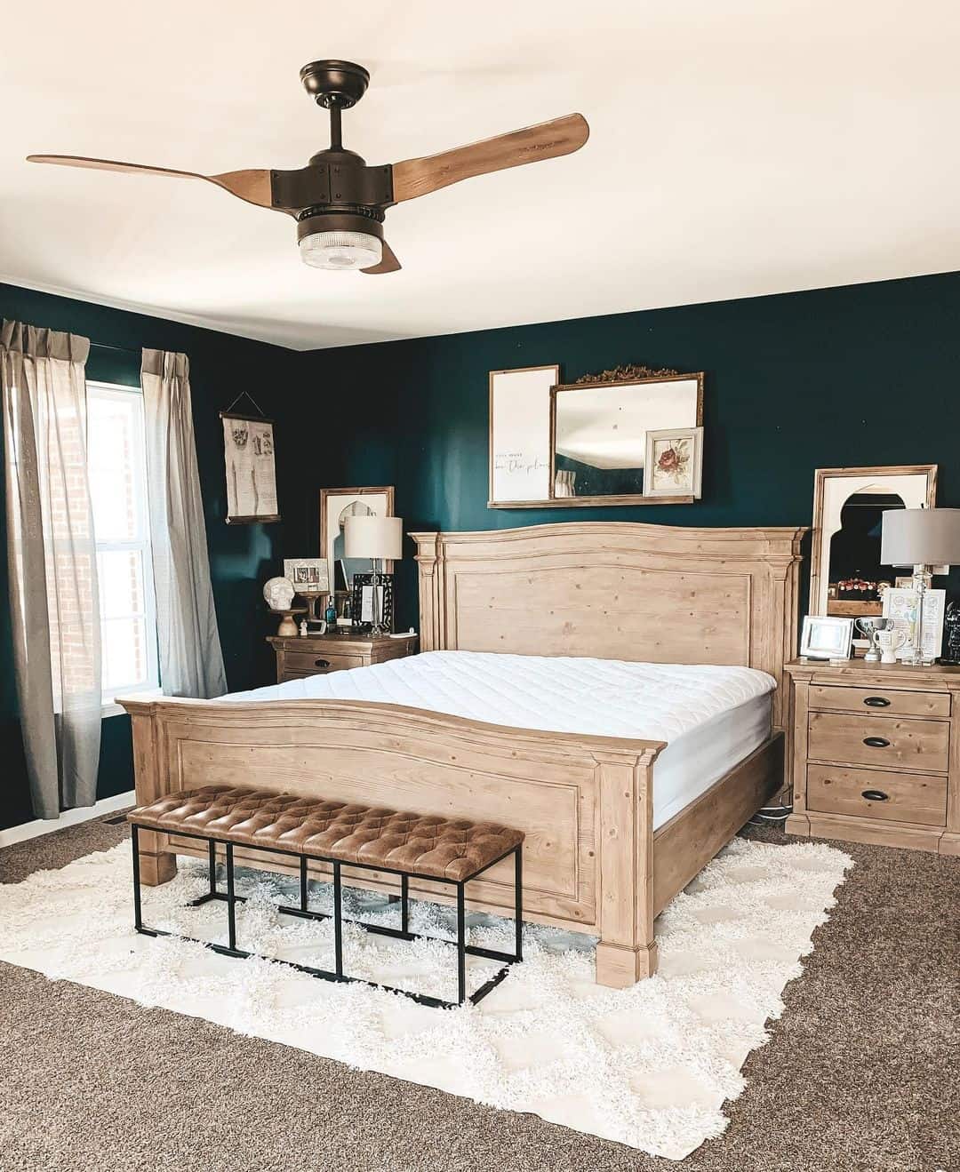 Deep Teal Walls Create a Moody, Enveloping Backdrop