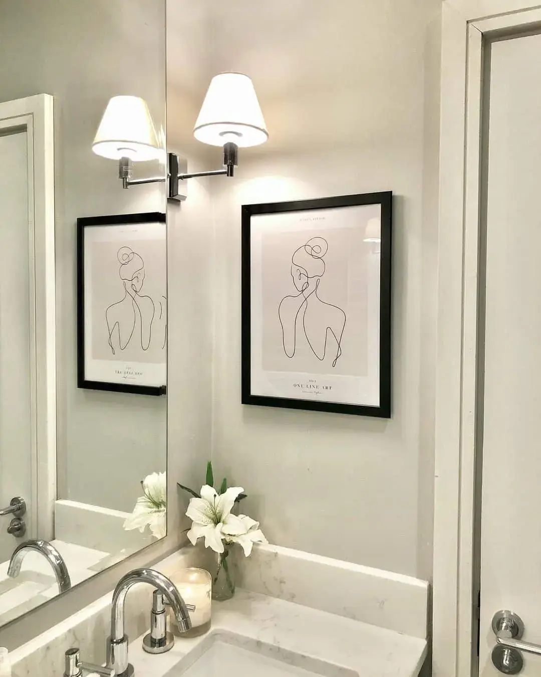 Framed Line Art Adds Subtle Serenity Above the Vanity