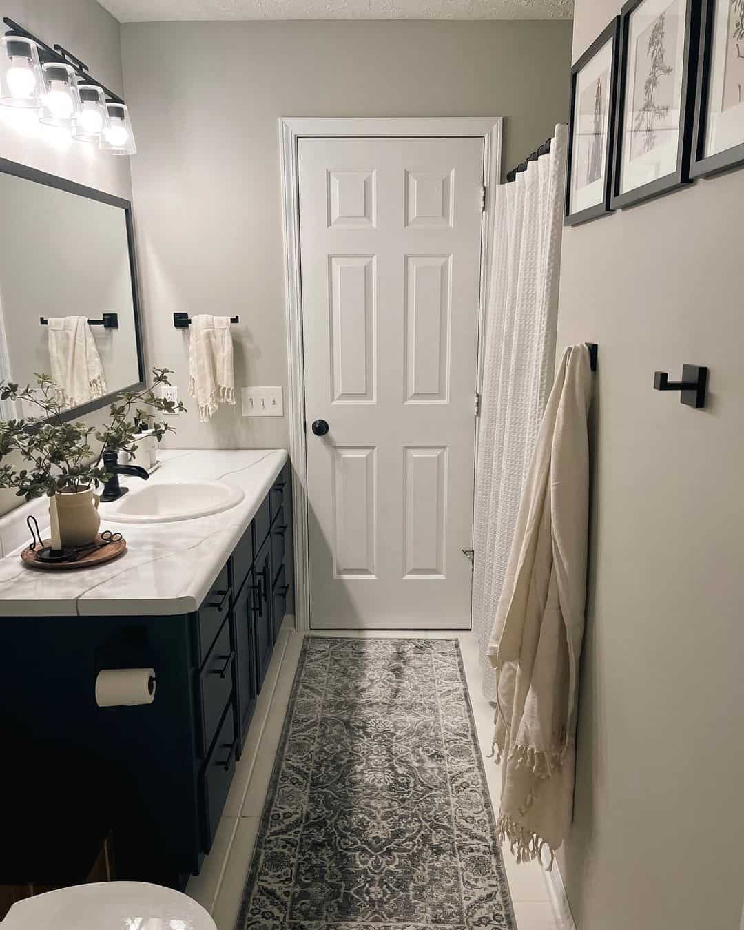 Dark Navy Vanity Cabinets Add Dramatic Contrast