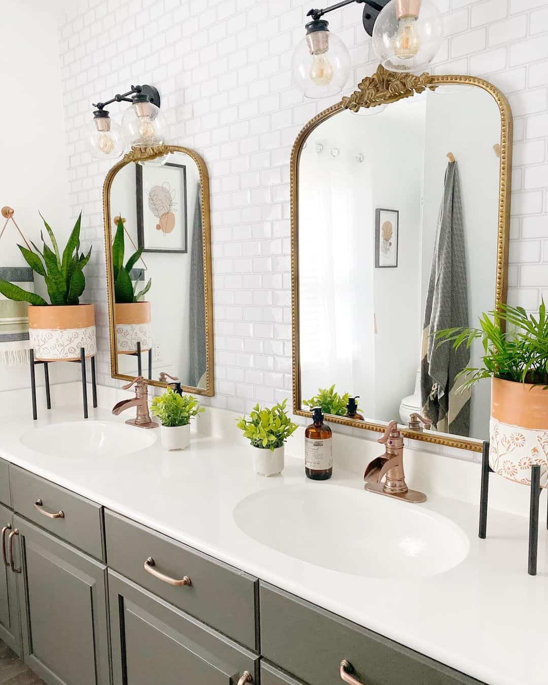 Ornate Gold Mirrors Frame the Subway Tile Wall