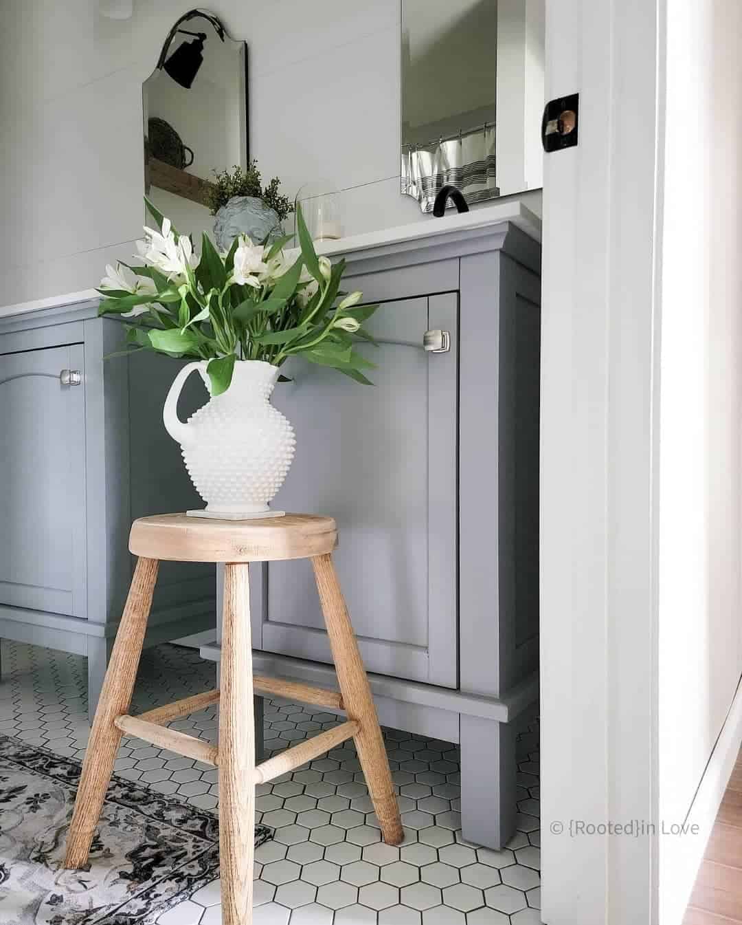 Wooden Stool Adds a Natural Element to Grey Vanity Space