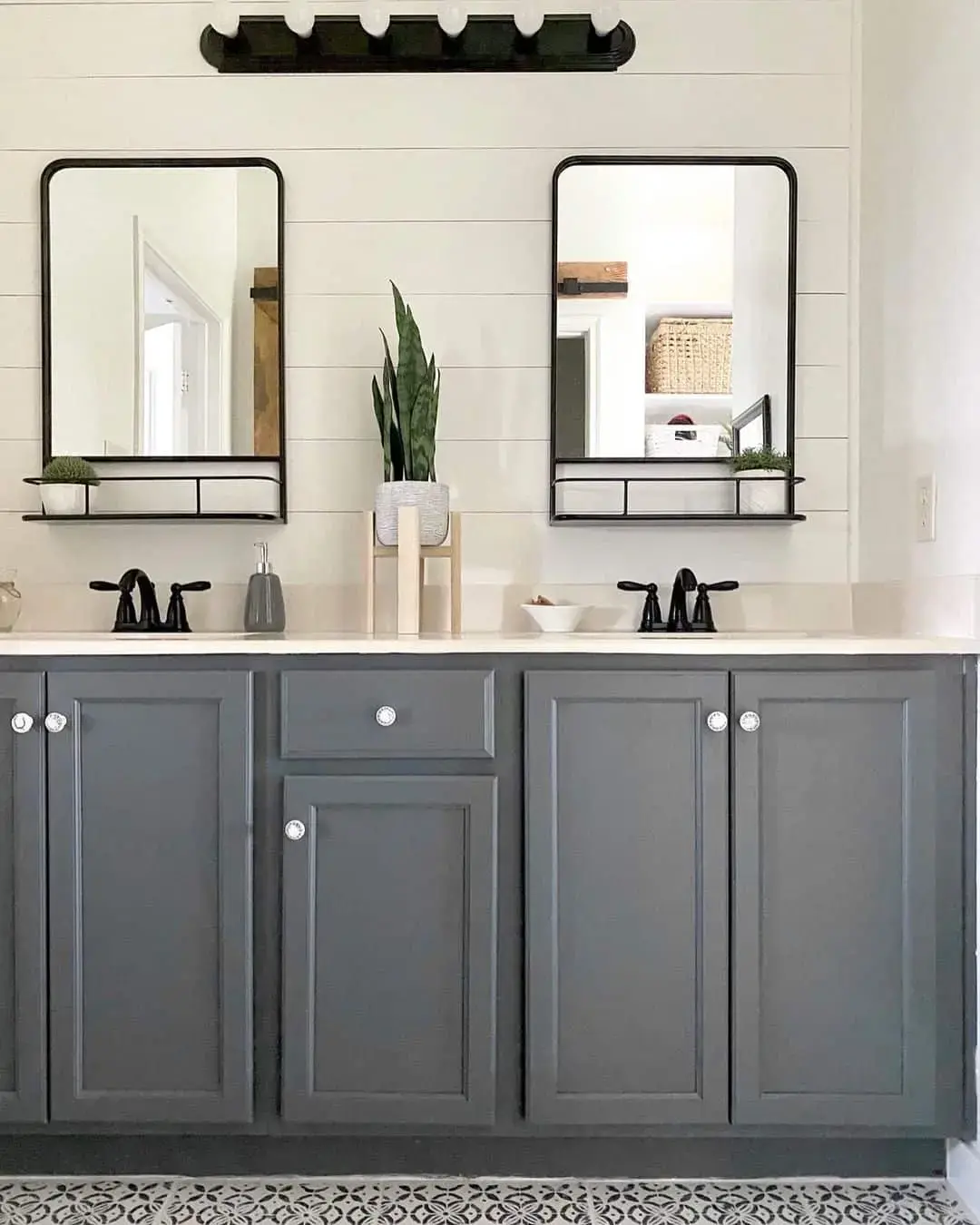 Matte Grey Vanity Cabinets Grounded by a Patterned Floor