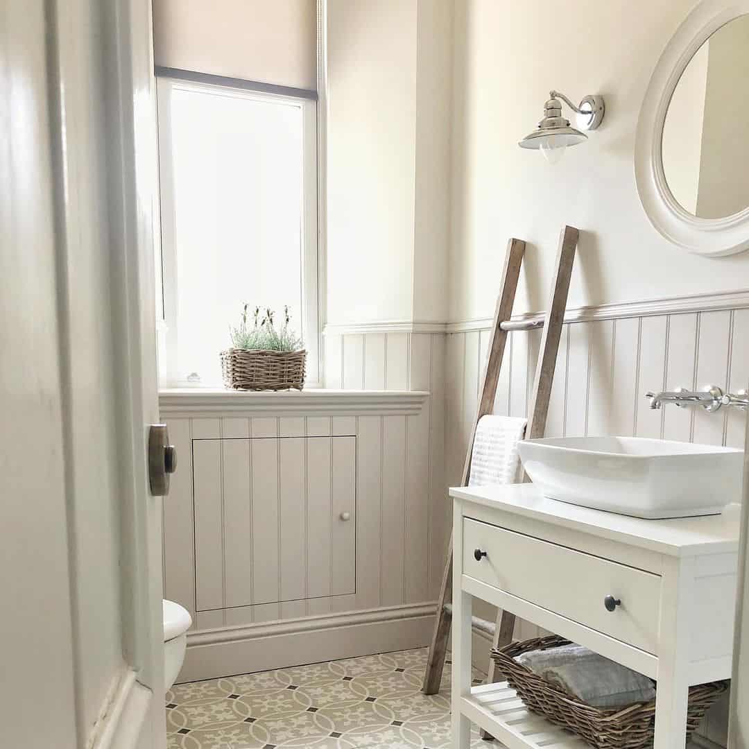 Wooden Ladder Adds Rustic Towel Storage Beside the Vanity