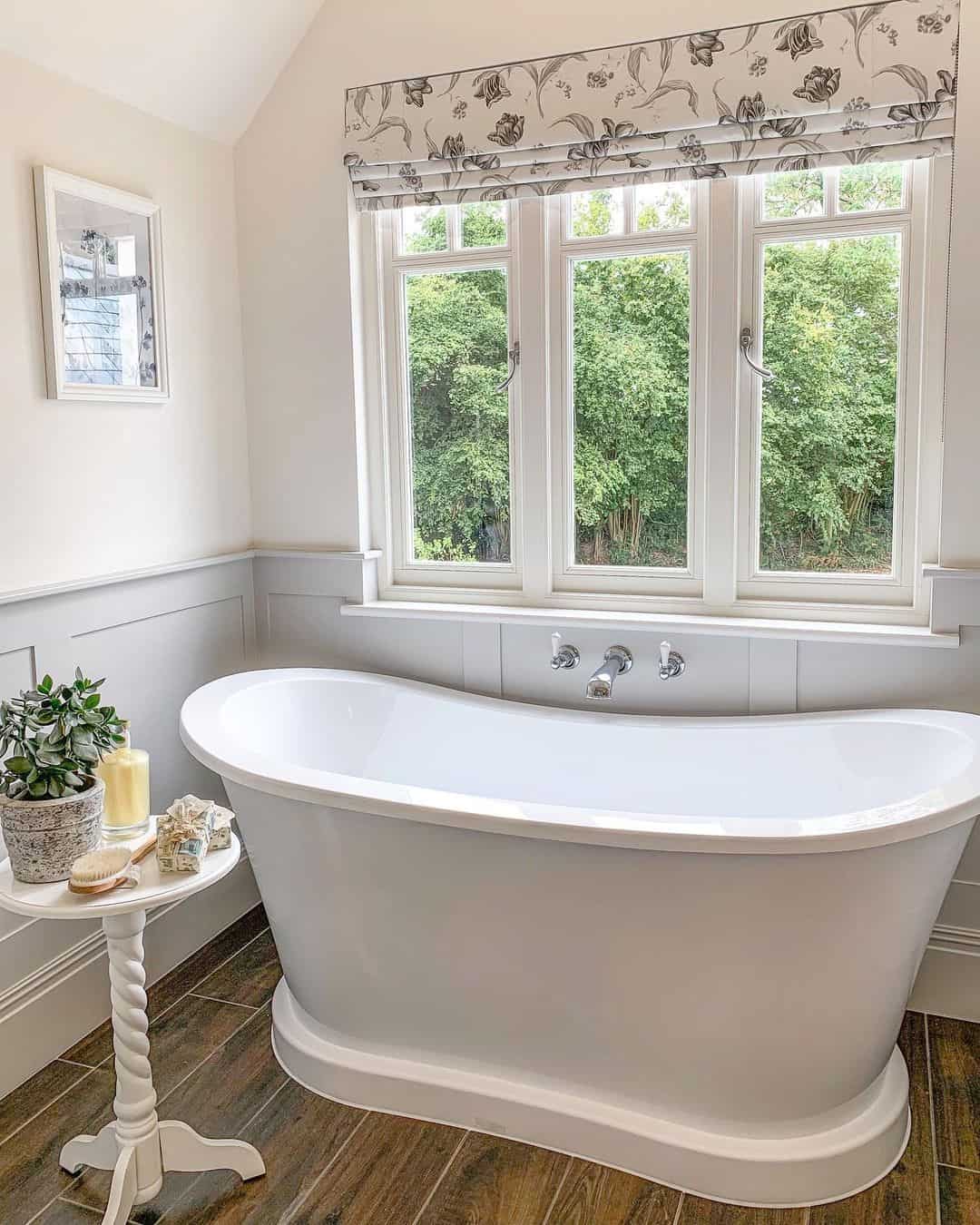 Floral Roman Shade Adds Pattern Above the Freestanding Tub