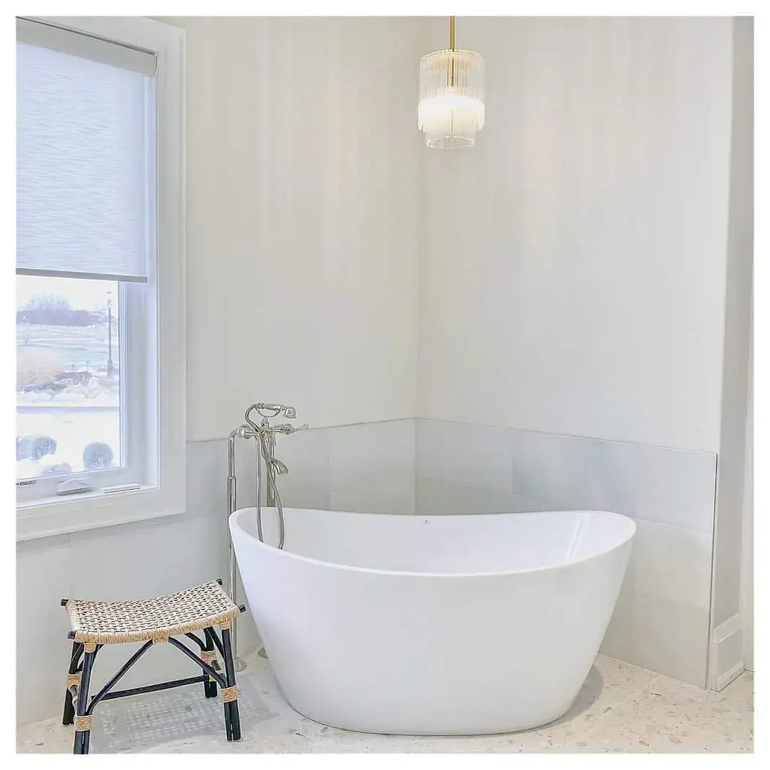 Woven Stool Adds Natural Texture Next to the Tub