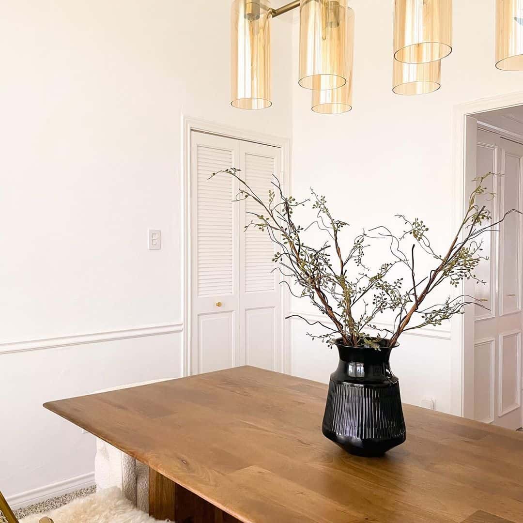 Fluted Black Vase Holds Dramatic Branch Arrangement