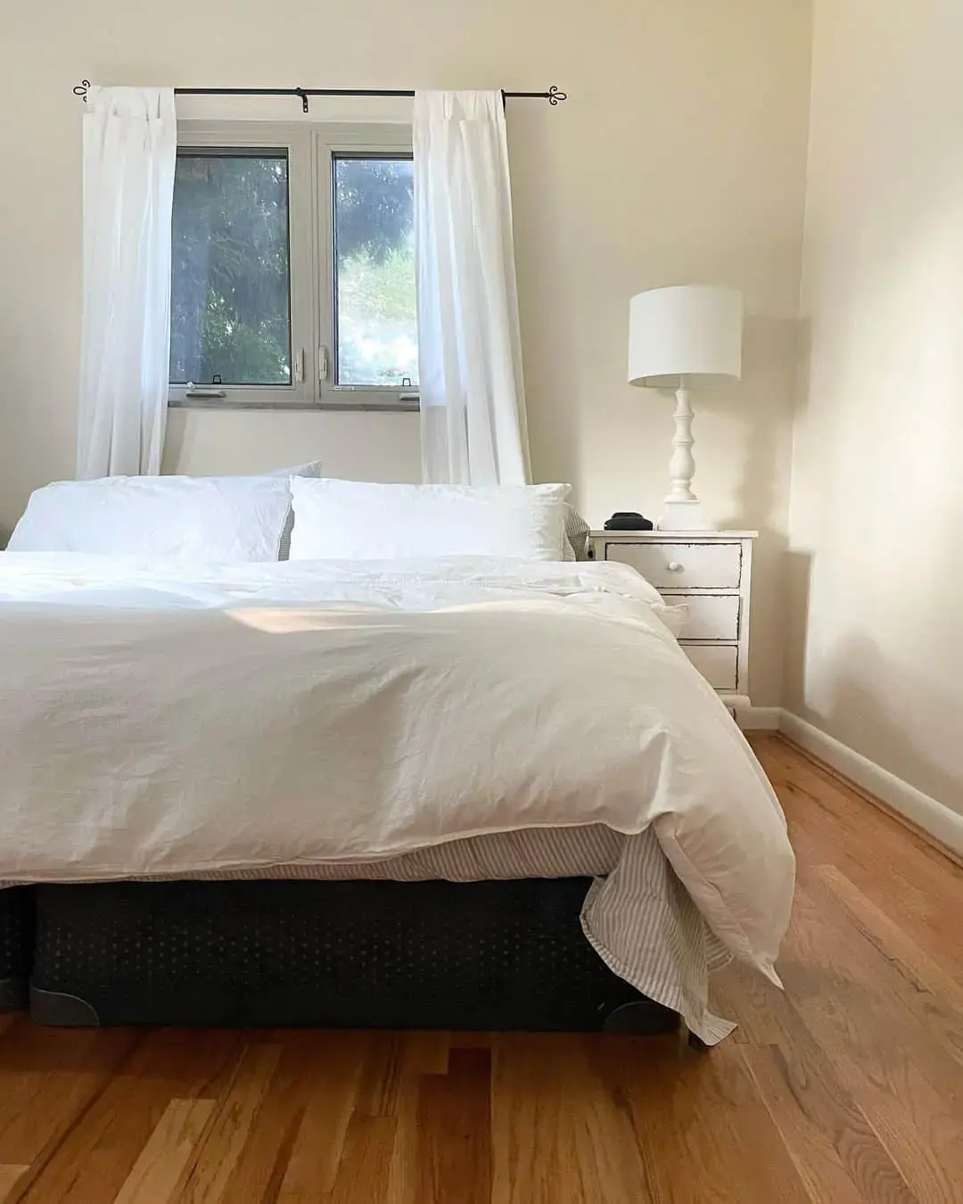 Conceal Under-Bed Storage with a Black Bed Skirt
