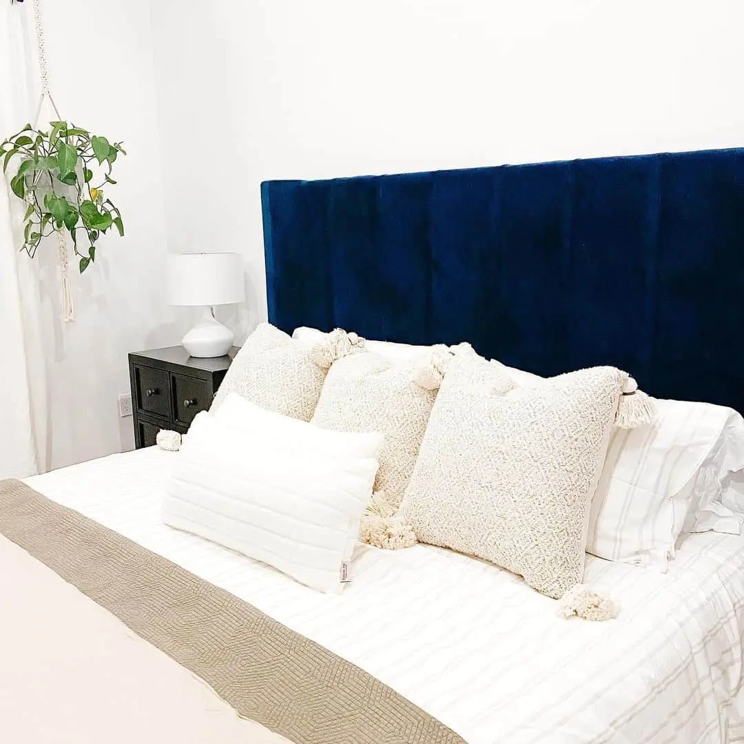 Deep Blue Velvet Headboard Adds a Plush Focal Point