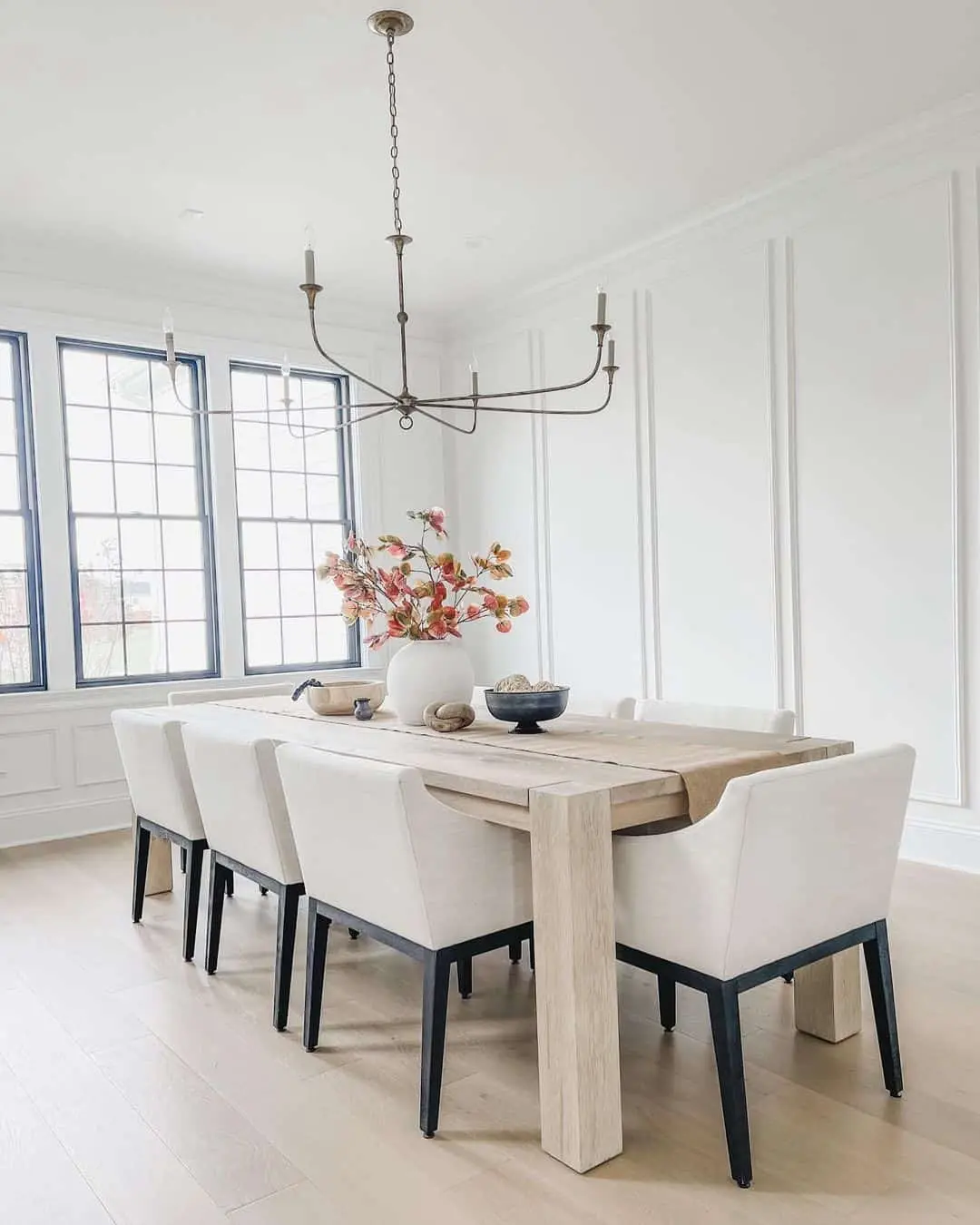 White Vase with Autumn Branches Creates a Natural Centerpiece