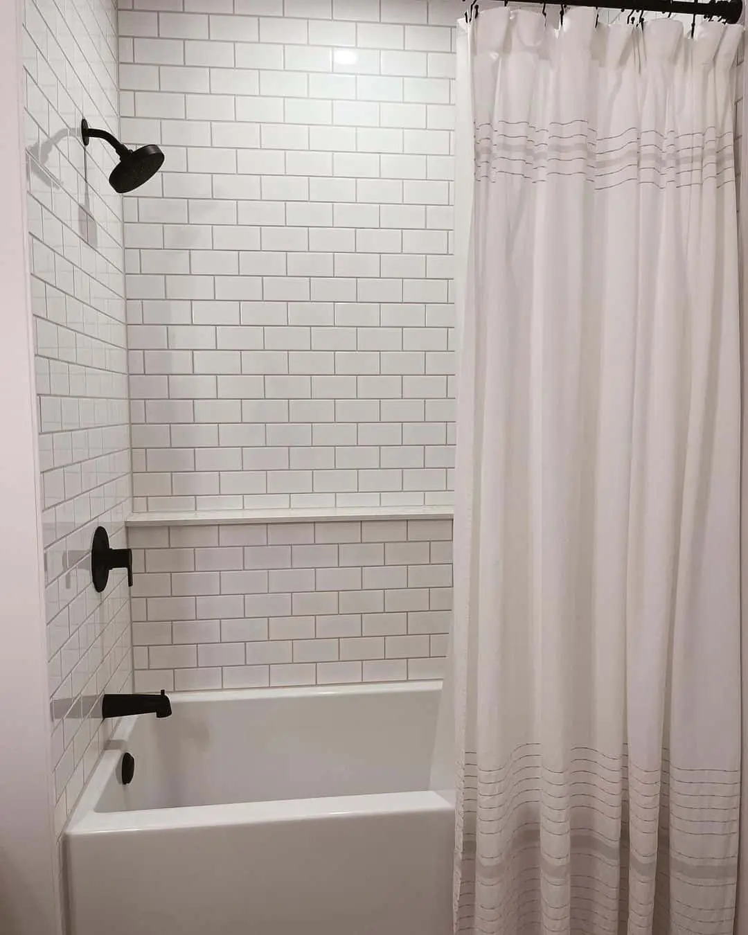 Contrast White Subway Tile with Black Fixtures