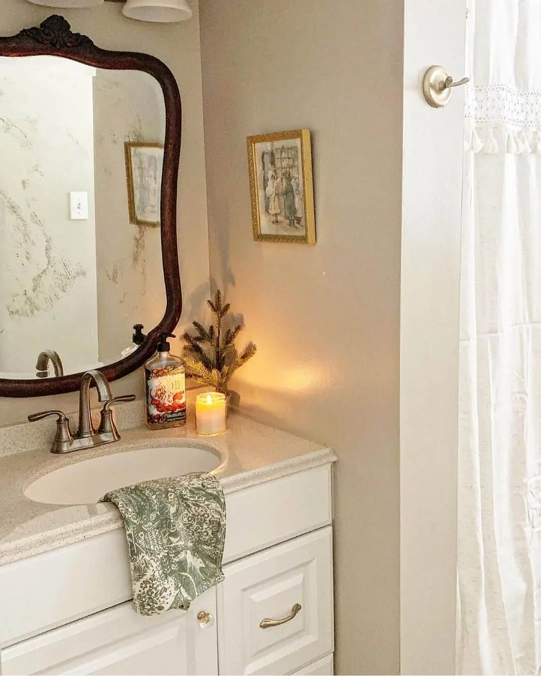 Vintage Artwork Adds Whimsy Above the Vanity