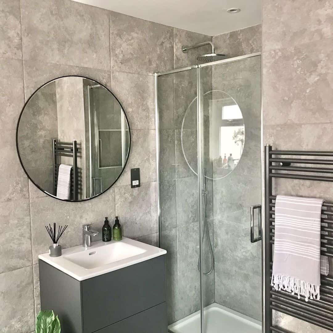 Textured Gray Tiles Create a Sophisticated Shower Enclosure