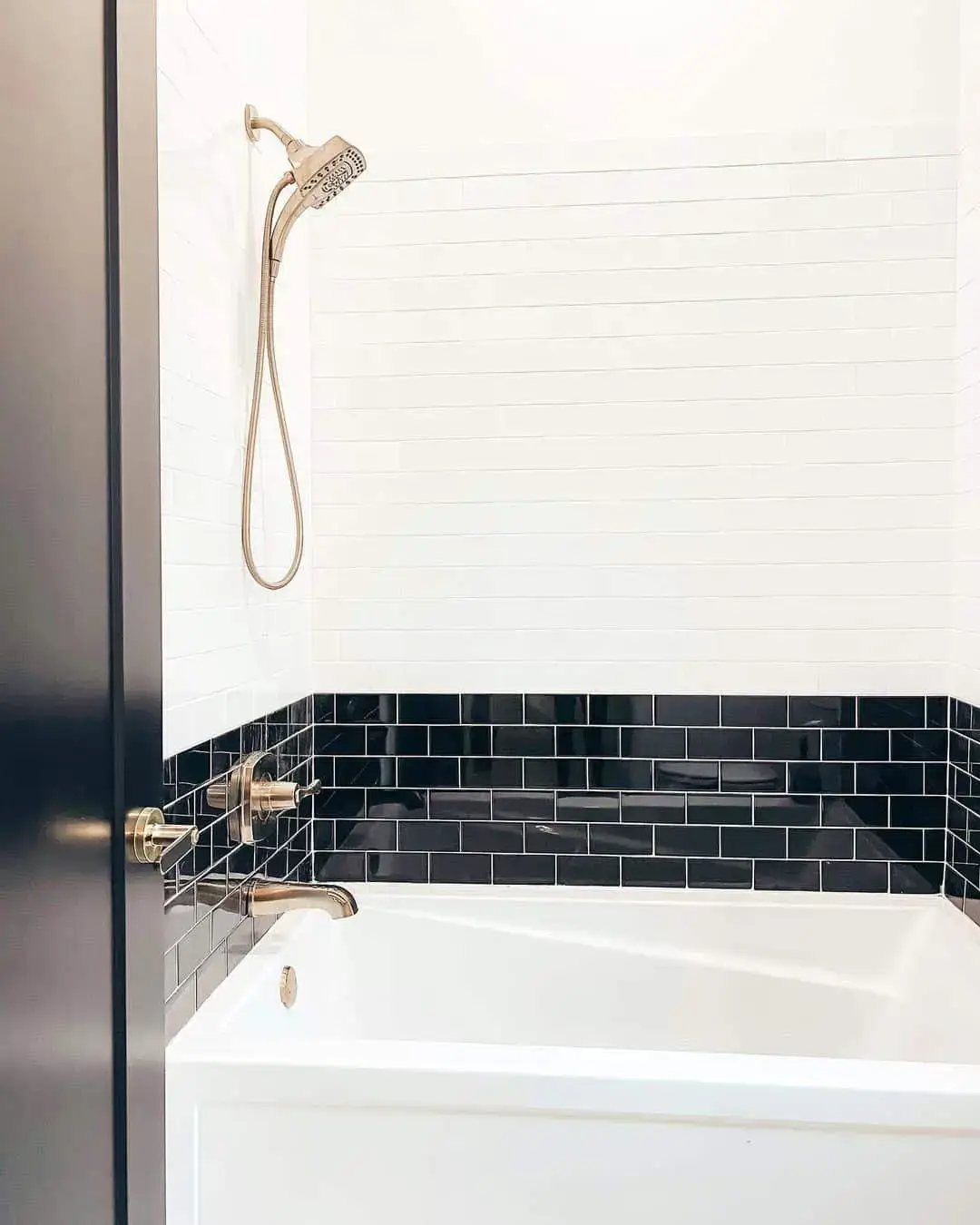 Two-Tone Tile Design Creates a Bold Shower Accent