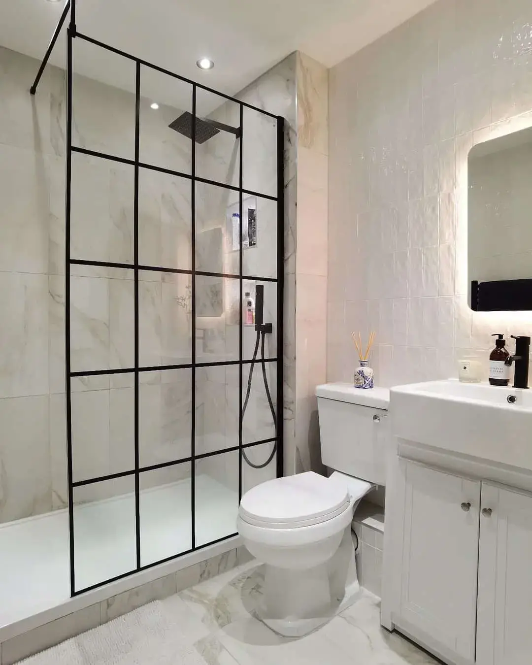 Black Grid Shower Enclosure Frames Marble-Look Walls