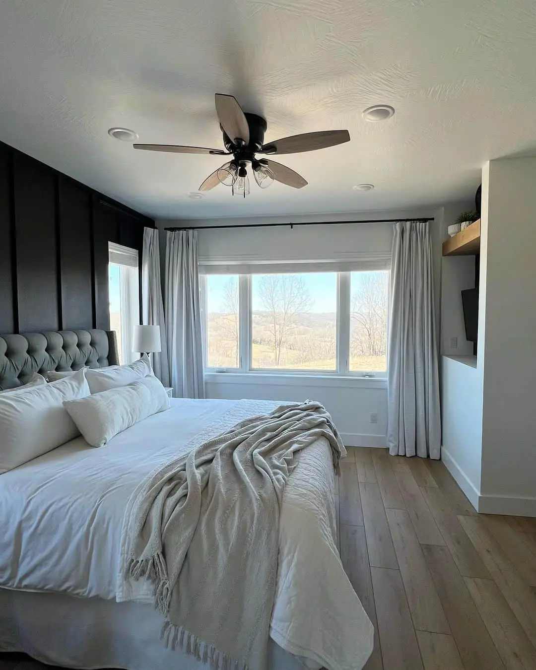 Dark Vertical Paneling Creates a Dramatic Accent Wall