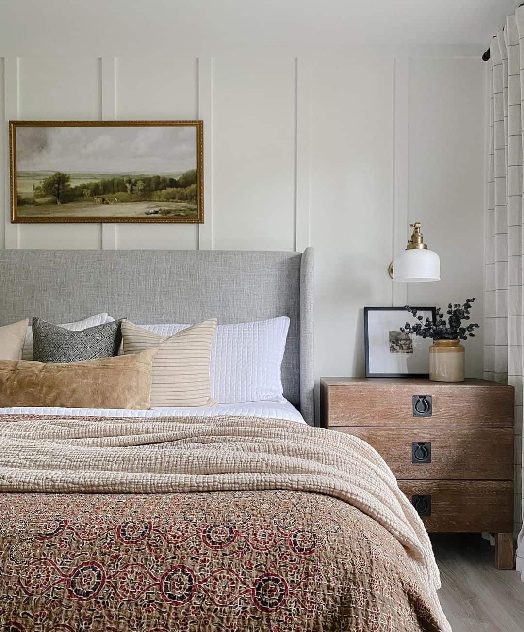Framed Landscape Art Adds a Serene Focal Point Above the Bed