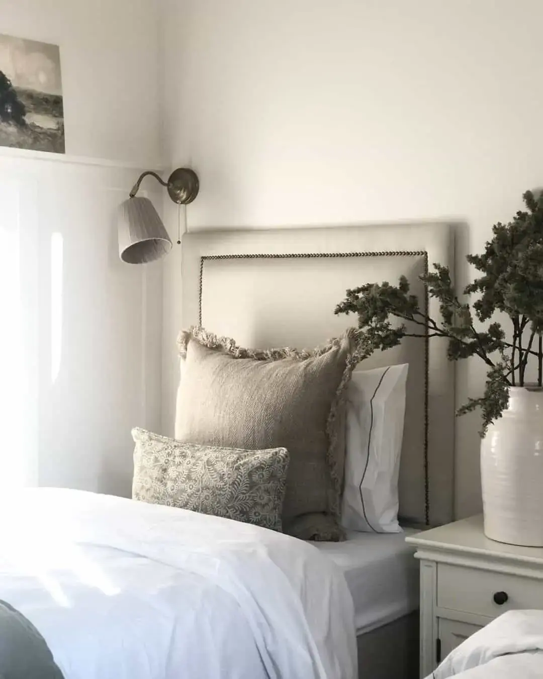 Textured Pillows Add Cozy Layers to a Neutral Bed