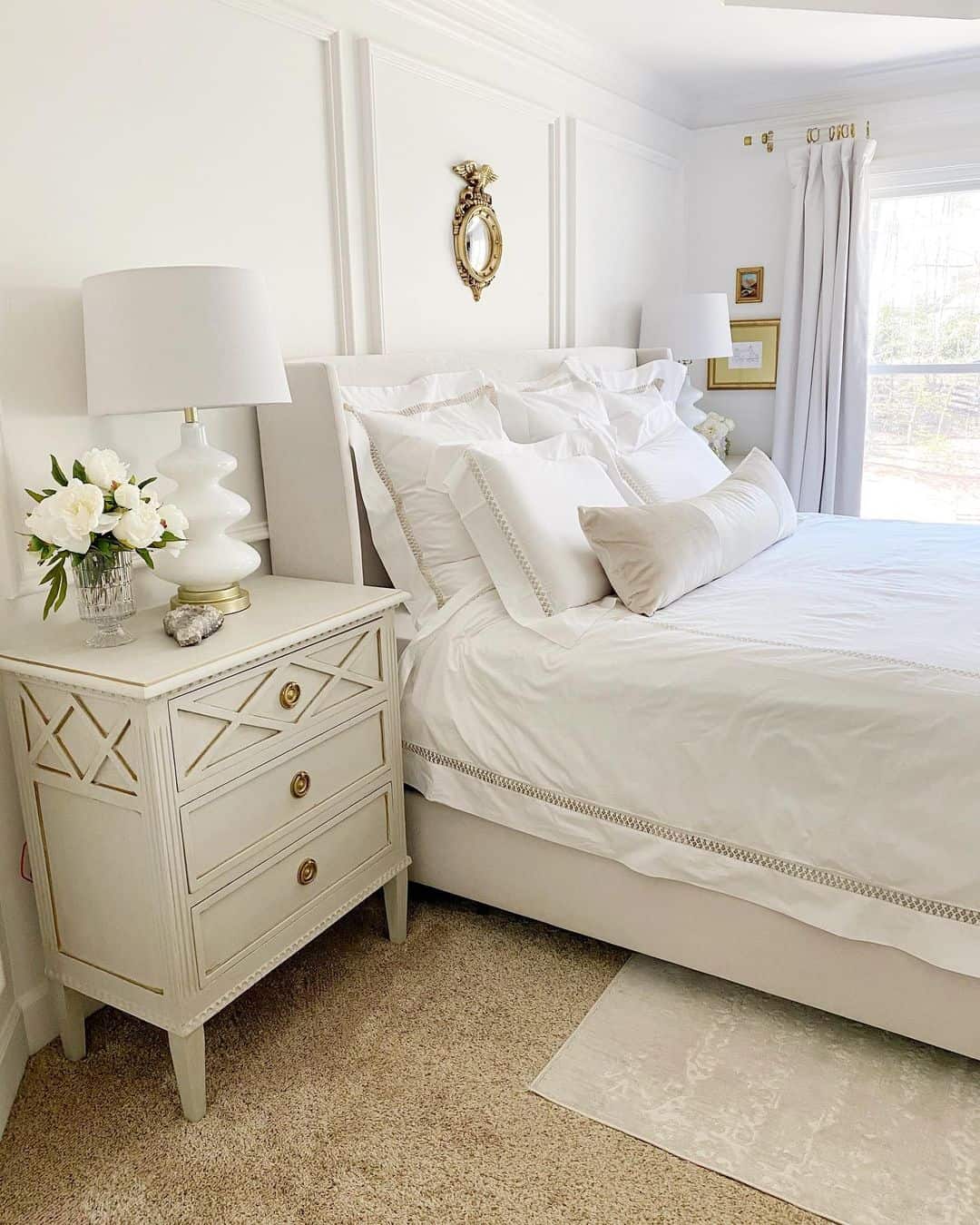 Paneled Wall Adds Architectural Detail Above the Bed