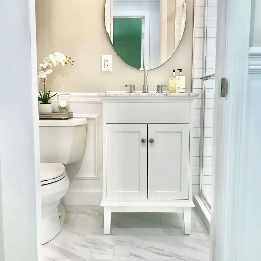 Brighten Your Bathroom with a White Vanity and Mirrored Doors