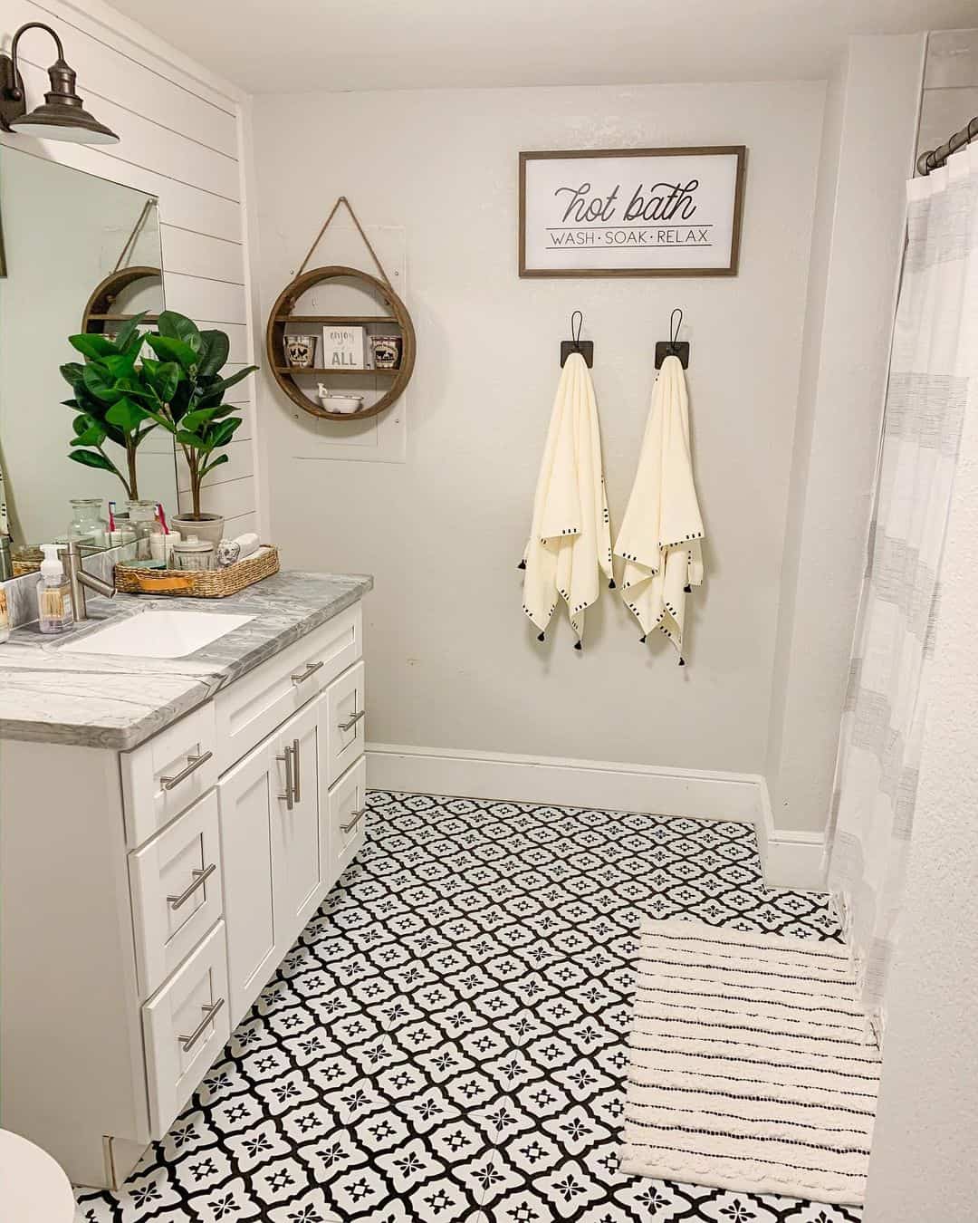 Round Wall Shelf Adds Decorative Storage Above Vanity