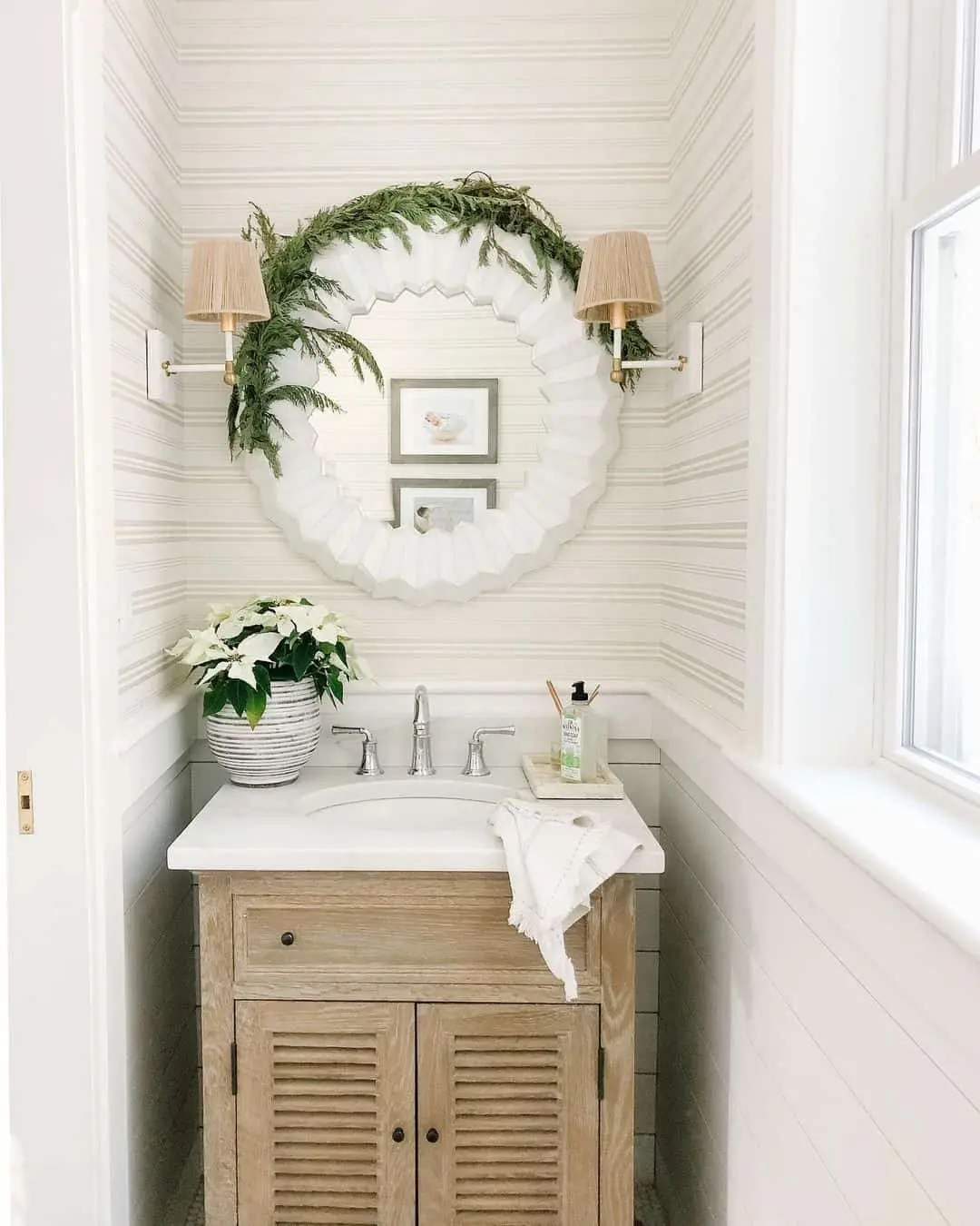 Louvered Doors on a Light Wood Vanity Create a Coastal Vibe