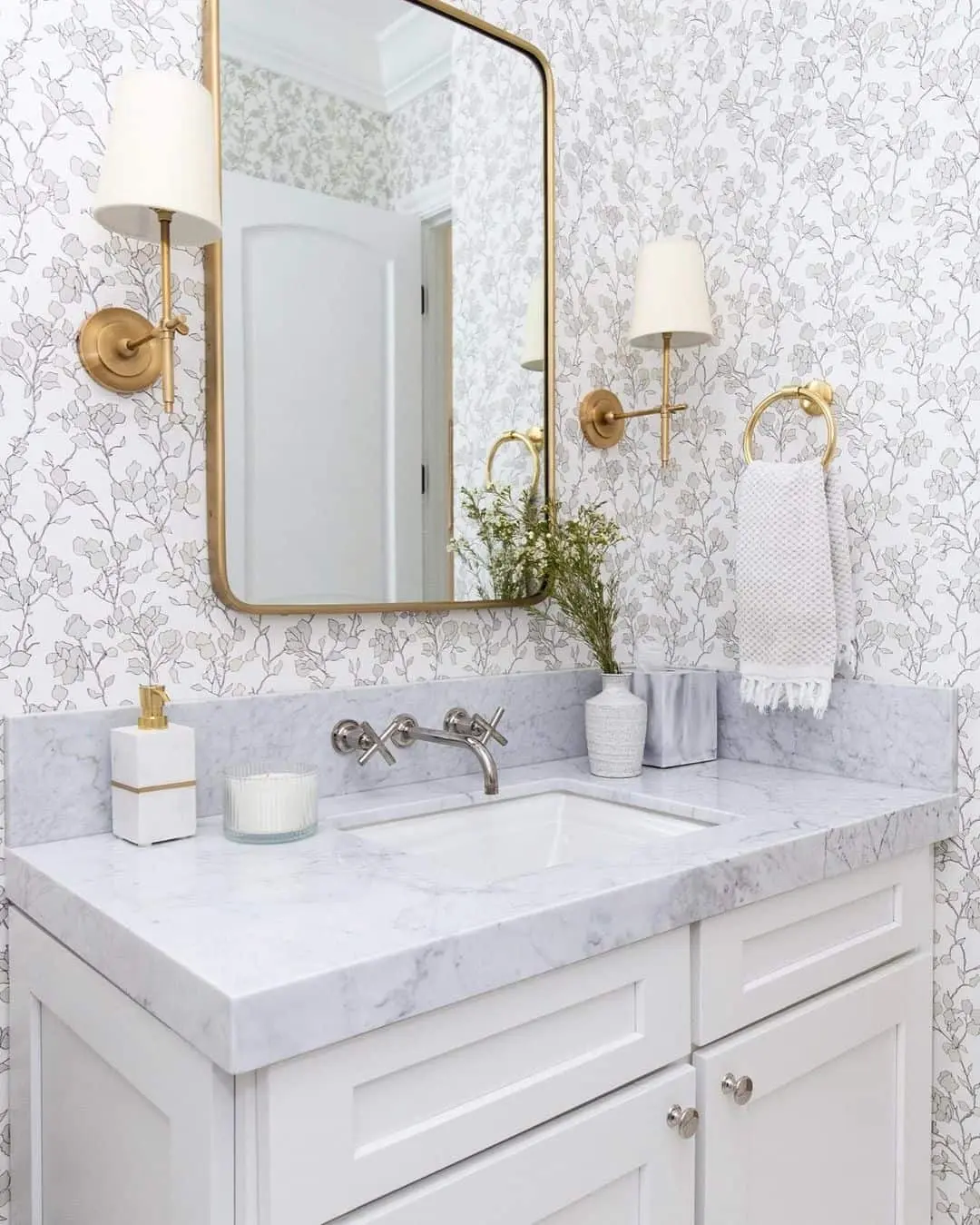 Delicate Floral Wallpaper Pairs Beautifully with a White Vanity