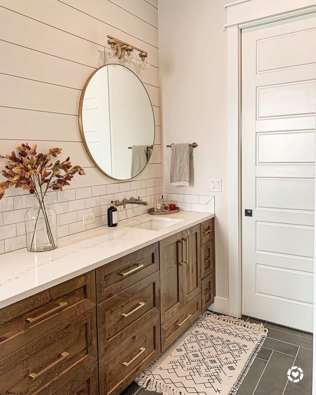 Ground Your Space with a Warm Wood Vanity and Brass Accents