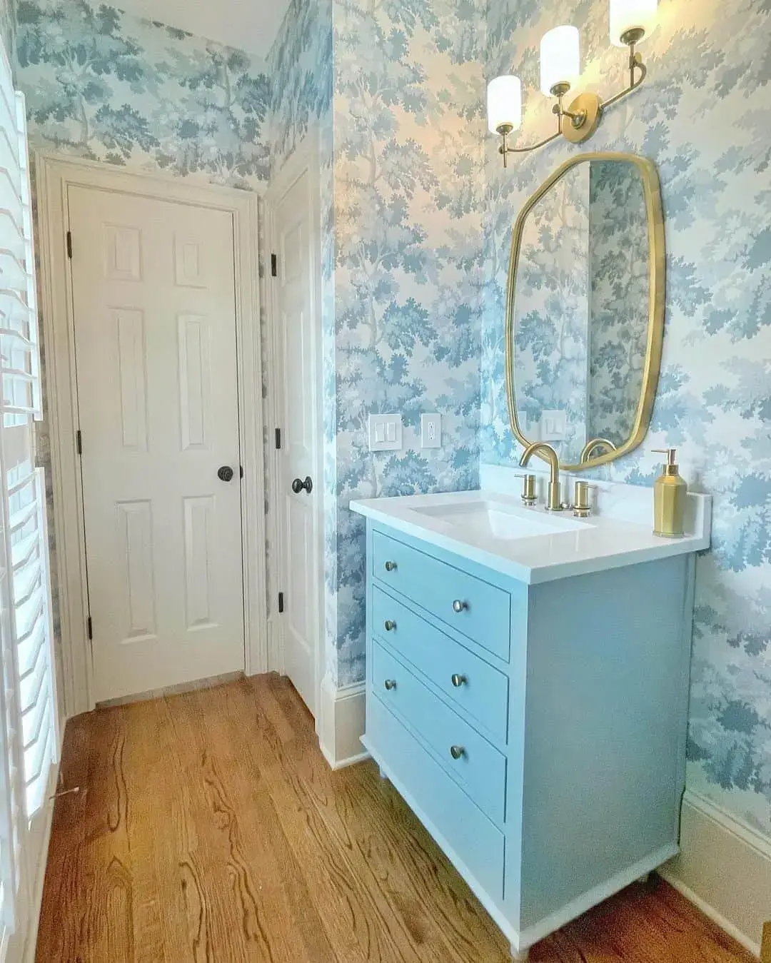 Opt for a Soft Blue Vanity with Simple, Functional Drawers