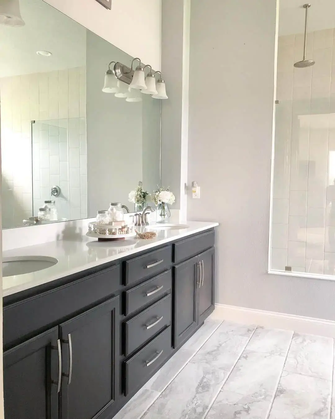 Glass Jars Hold Cotton Balls and Other Small Bath Essentials