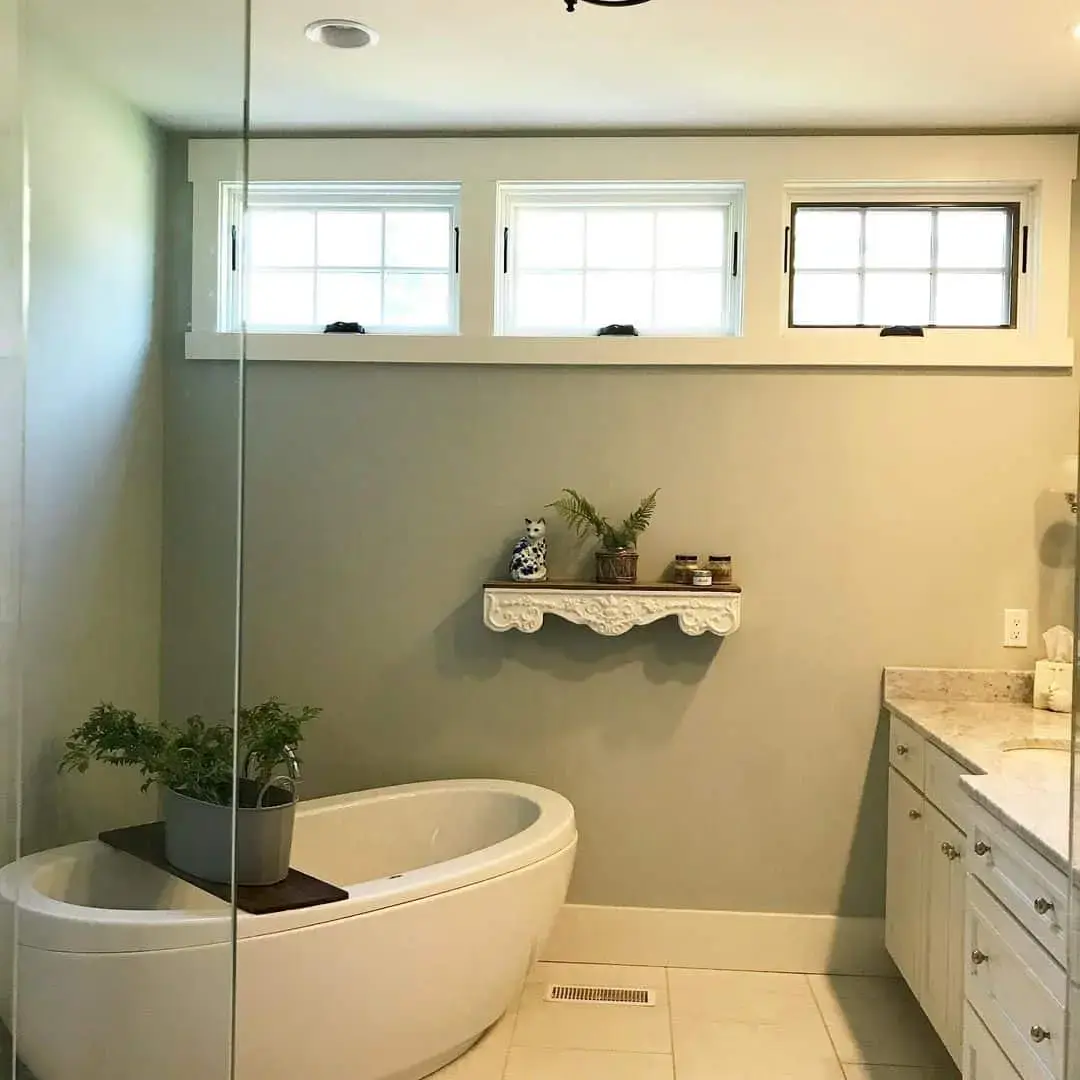 Ornate Shelf Holds Small Bathroom Accents and Greenery