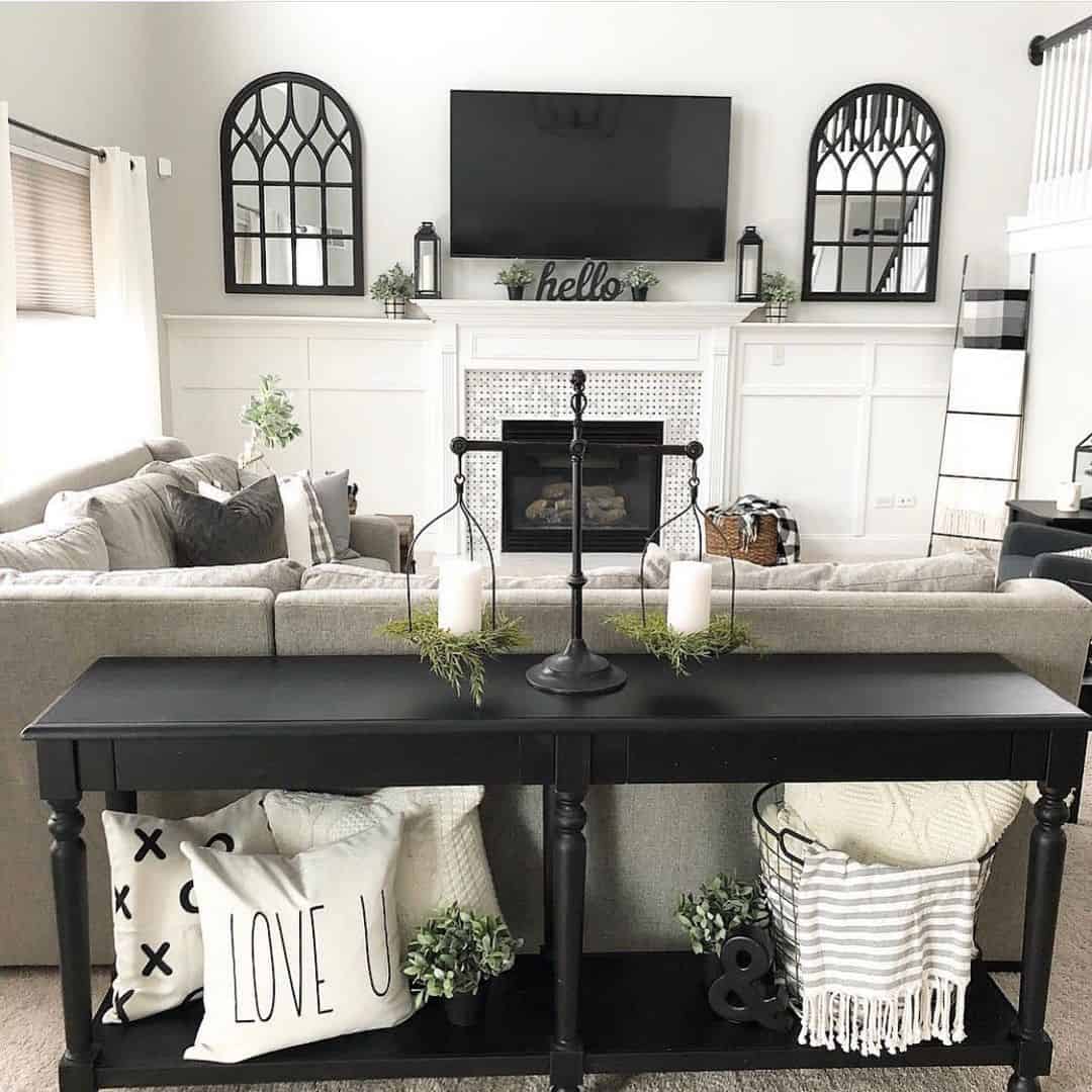 Black Console Table Frames Cozy Pillow and Blanket Storage