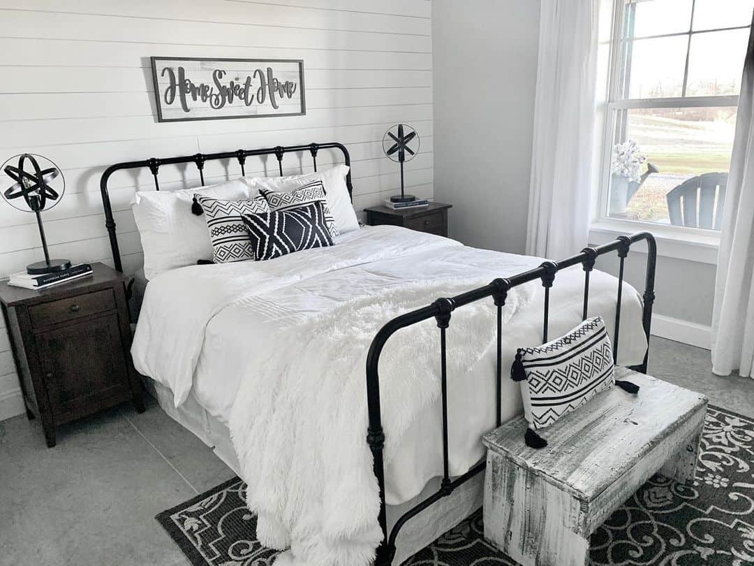 Distressed White Storage Bench Adds Rustic Charm to Bedroom