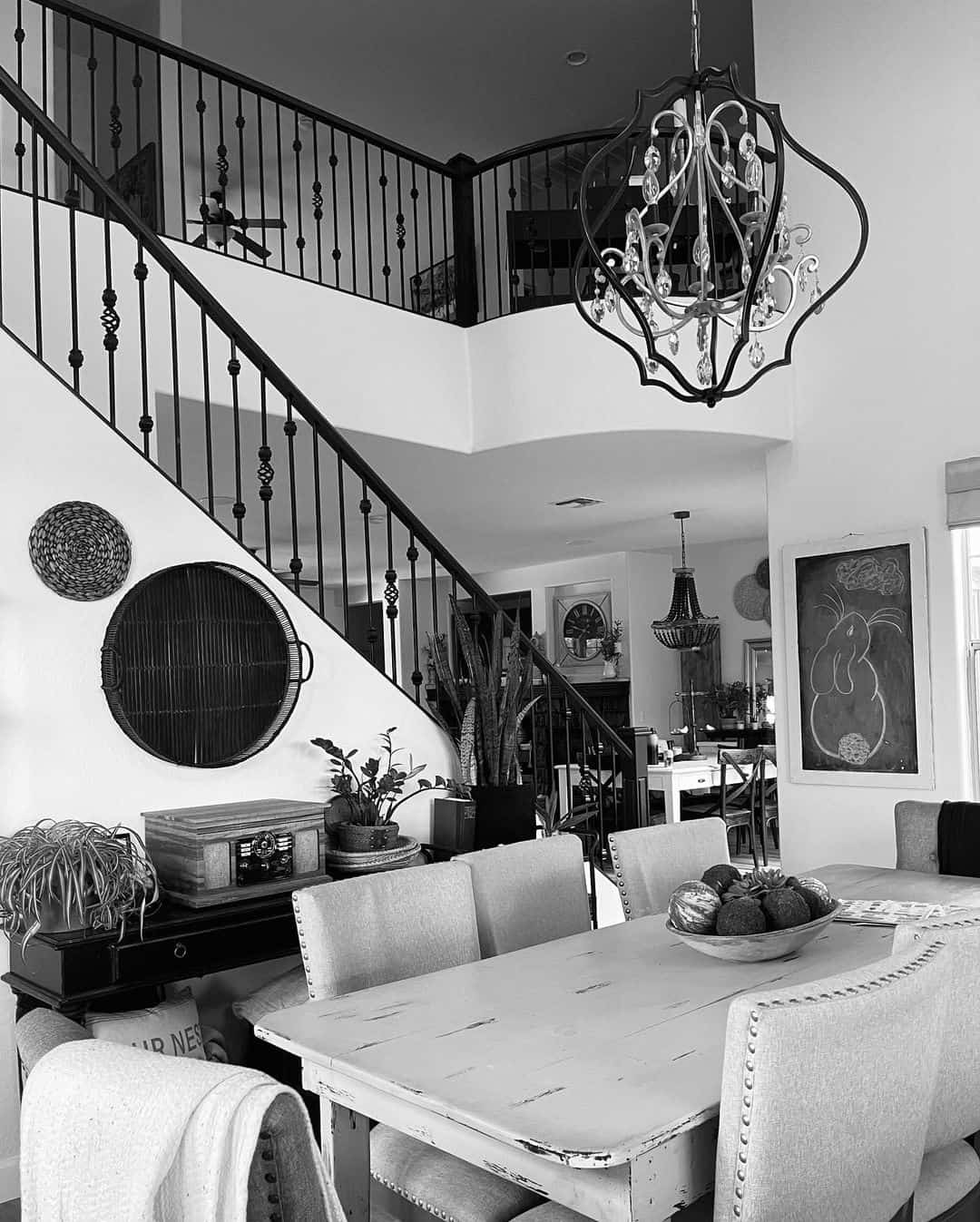 Oversized Woven Trays Add Organic Scale to a Stairwell Wall