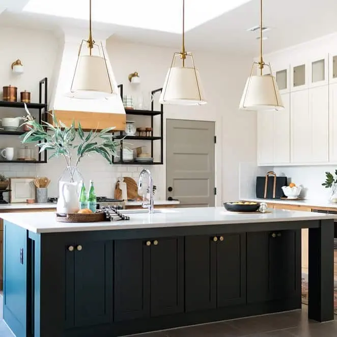 Dark Island with Brass Knobs for Dramatic Contrast